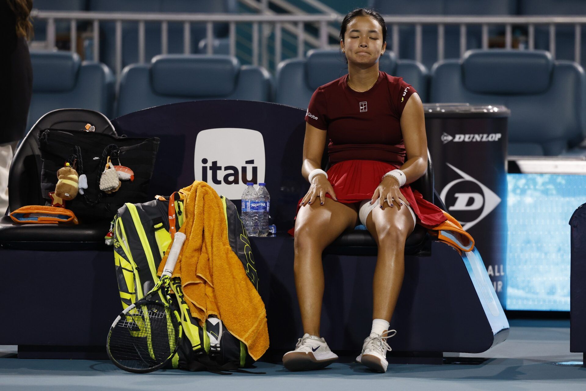 Alexandra Eala (PHL) sits in her player's chair after her match against Jessica Pegula (USA)(not pictured) in a women's singles semifinal on day ten of the Miami Open at Hard Rock Stadium.