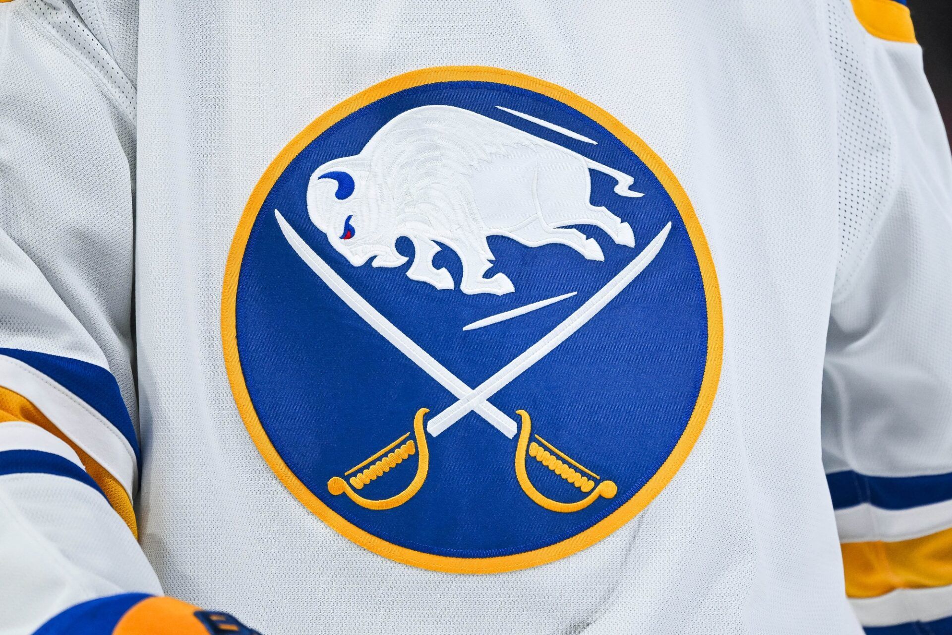 View of a Buffalo Sabres logo on a jersey worn by a member of the team during the second period at Bell Centre.