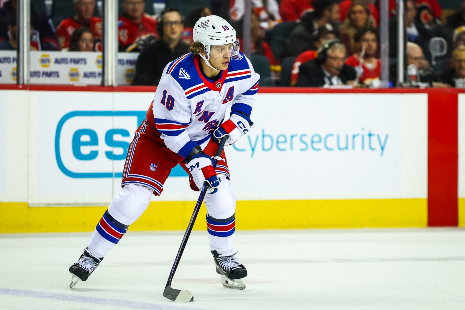 New York Rangers left wing Artemi Panarin (10) controls the puck against the Calgary Flames during the second period at Scotiabank Saddledome.