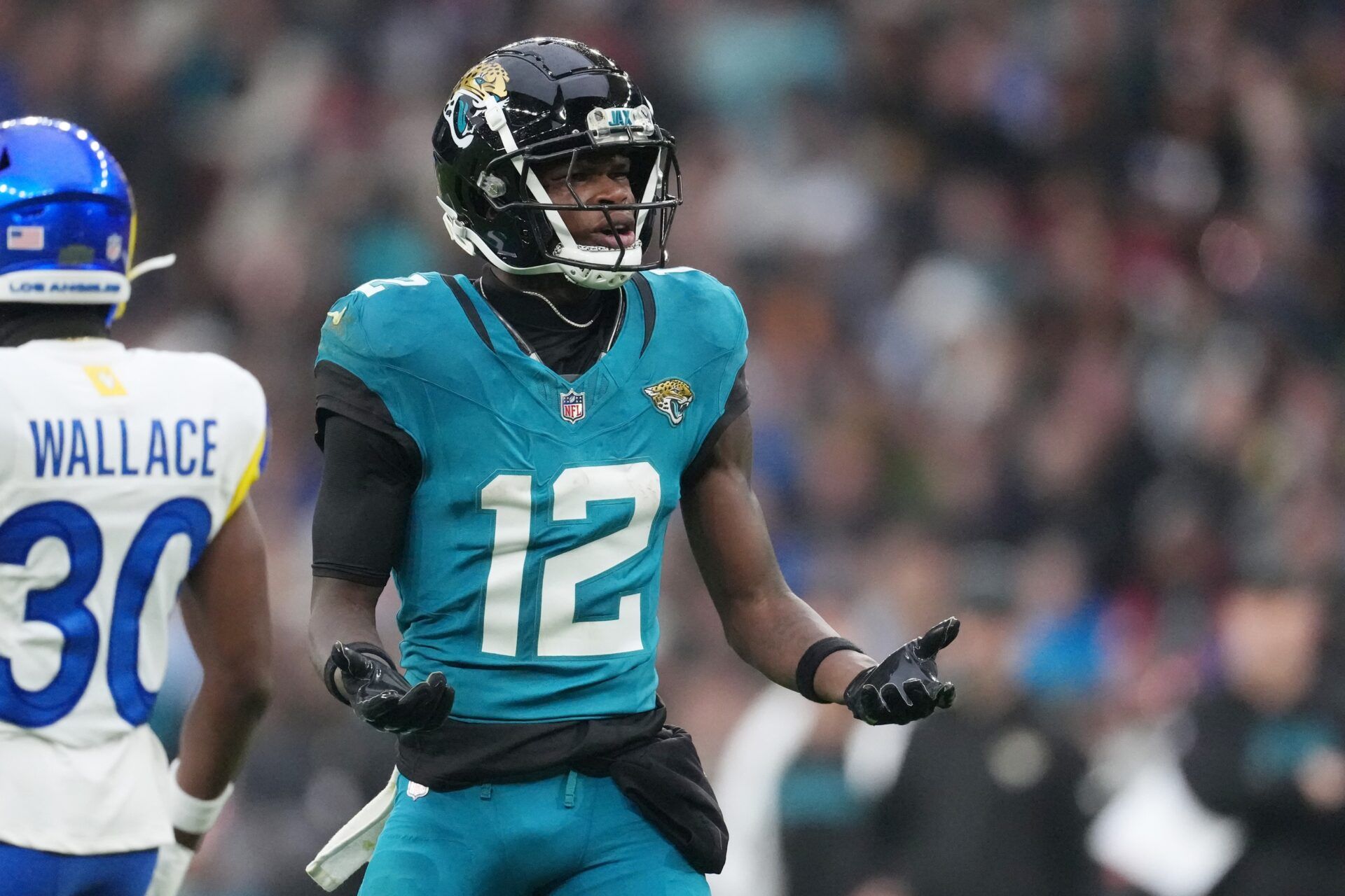 Jacksonville Jaguars wide receiver Travis Hunter (12) reacts after a play against the Los Angeles Rams during the second half of an NFL International Series game at Wembley Stadium.