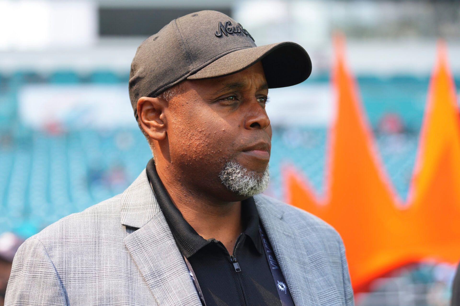 Miami Dolphins general manger Chris Grier enters the field prior to a game between the Miami Dolphins and the Los Angeles Chargers at Hard Rock Stadium.
