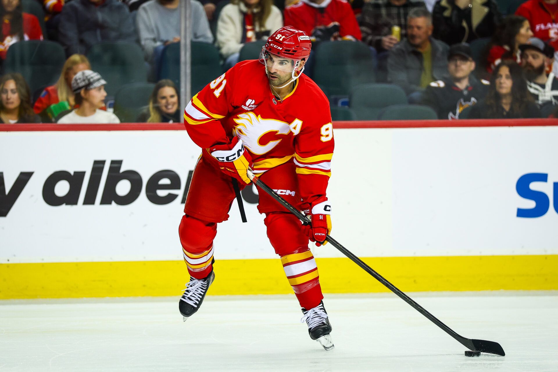 Calgary Flames center Nazem Kadri (91) controls the puck against the New York Rangers during the second period at Scotiabank Saddledome.