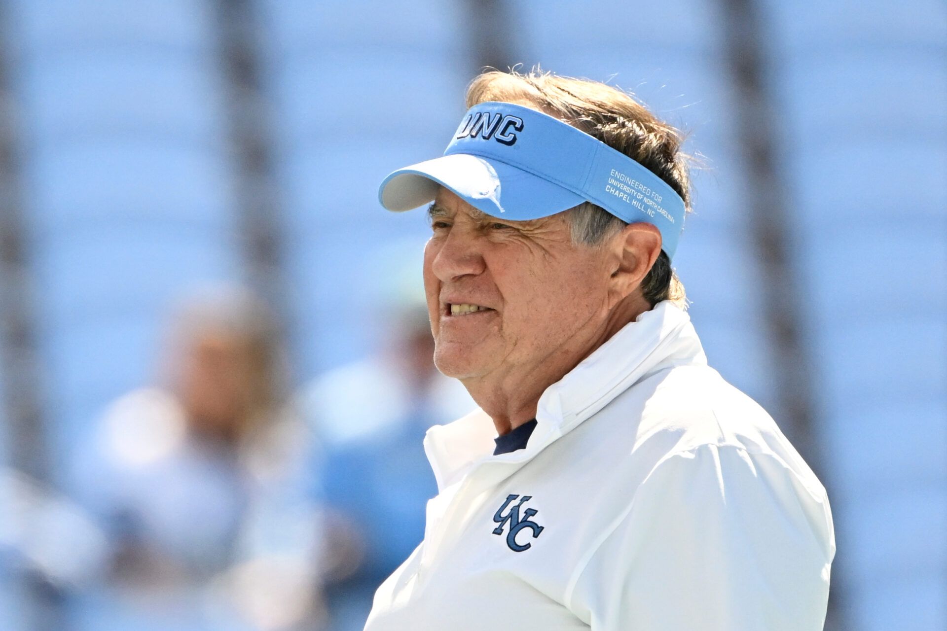 North Carolina Tar Heels head coach Bill Belichick on the field before the game at Kenan Stadium.