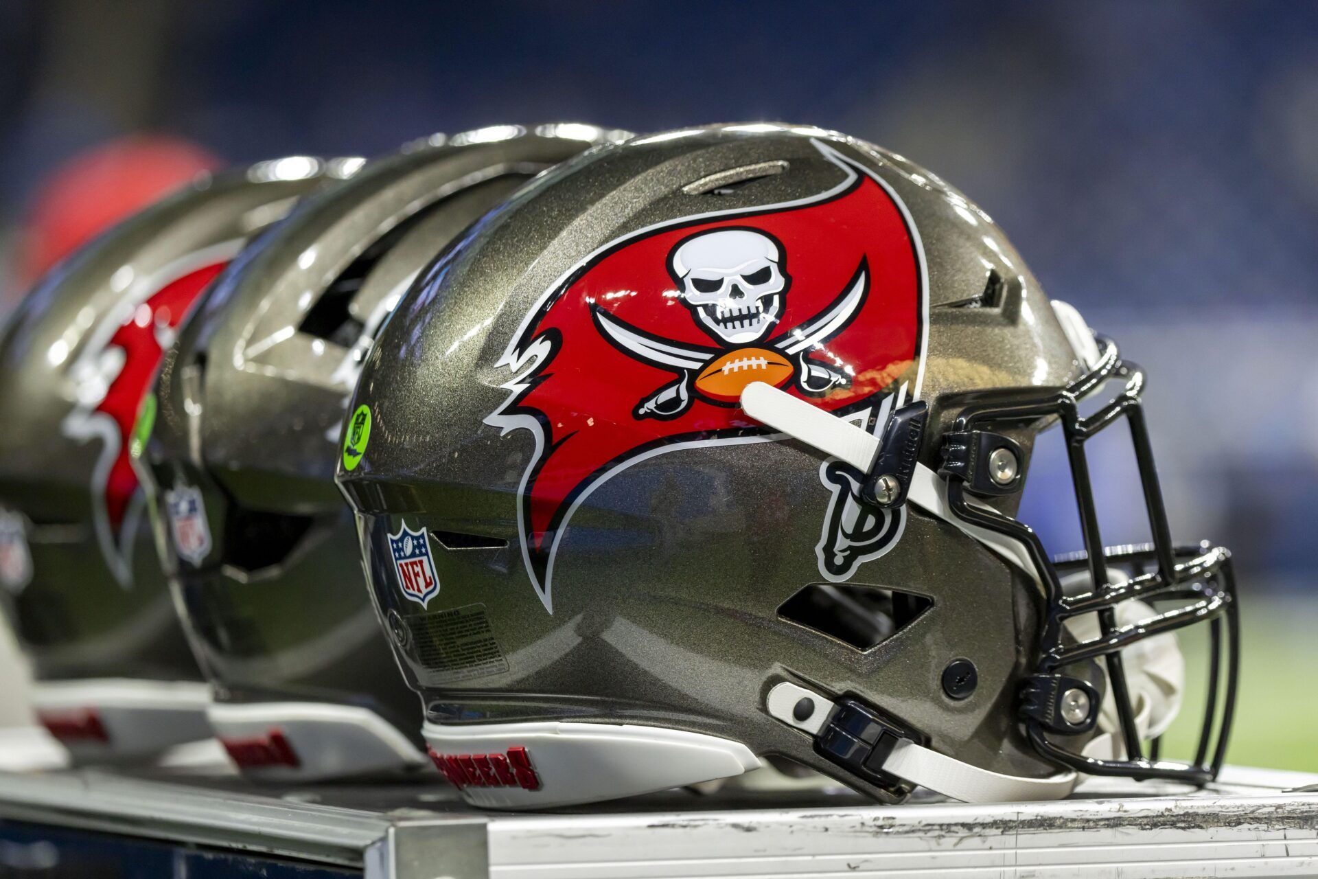 The Tampa Bay Buccaneers helmet sits on an equipment locker before the game at Ford Field.