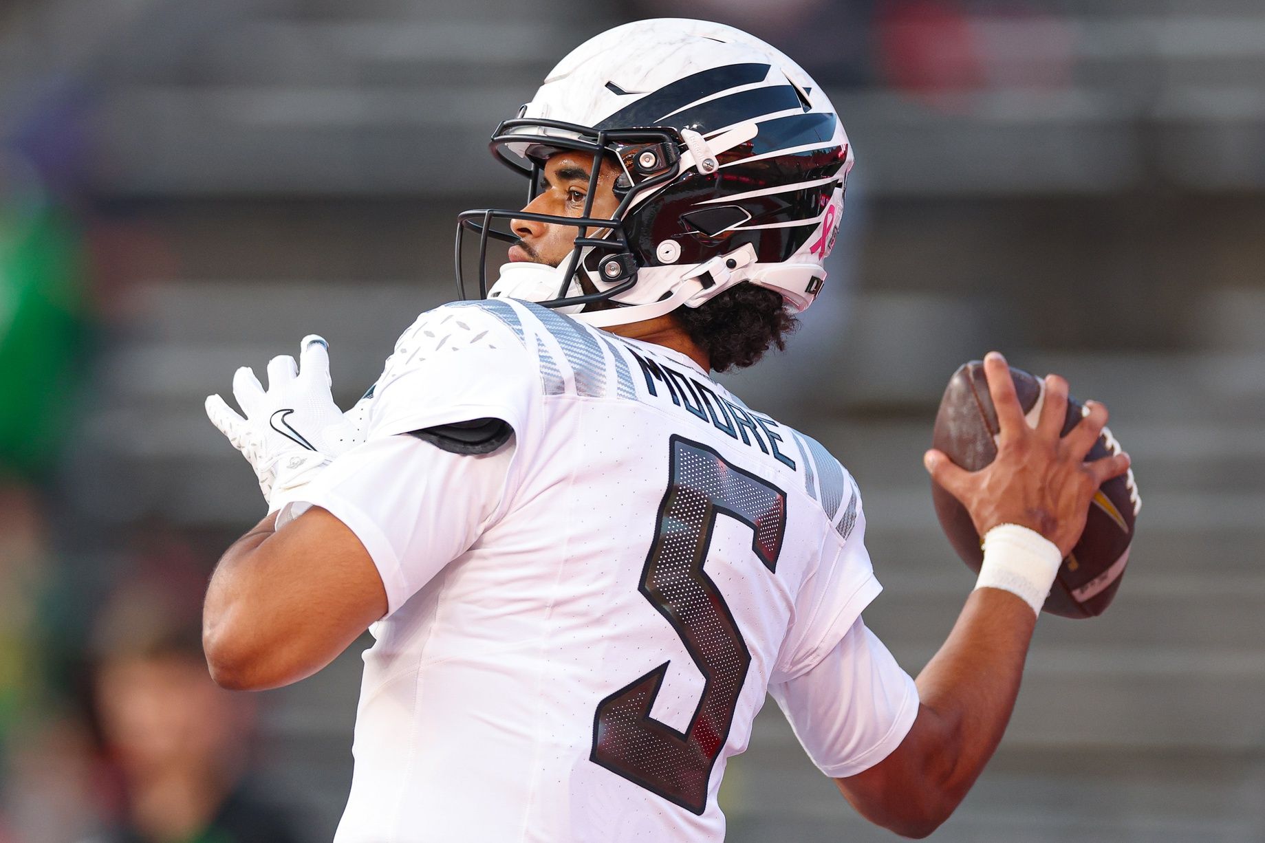 Oregon Ducks quarterback Dante Moore (5) warms up before the game against the Rutgers Scarlet Knights at SHI Stadium.