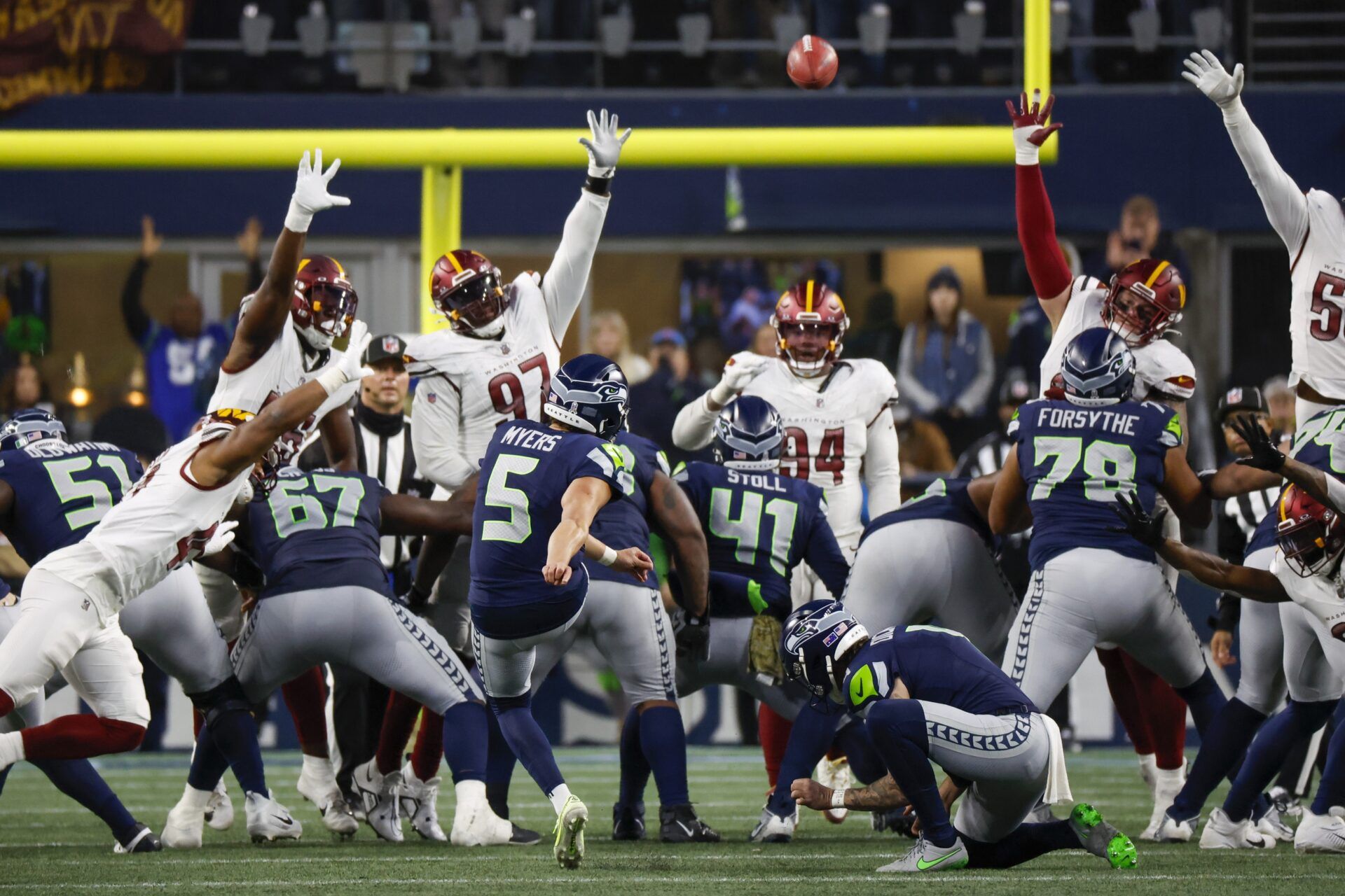 Seattle Seahawks place kicker Jason Myers (5) kicks a 43-yard field goal against the Washington Commanders during the fourth quarter at Lumen Field.
