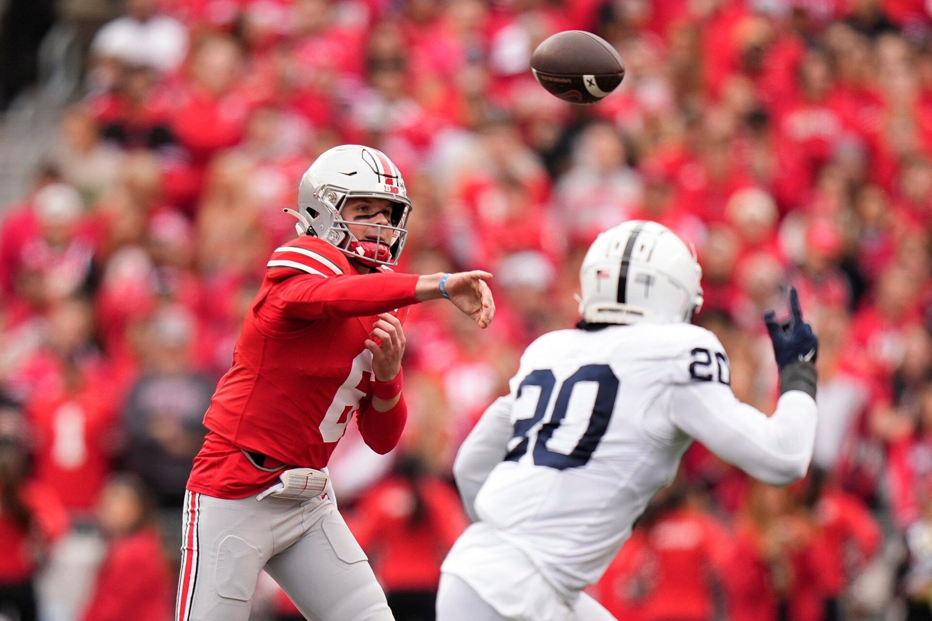 Ohio State quarterback Kyle McCord throws the ball against Penn State.