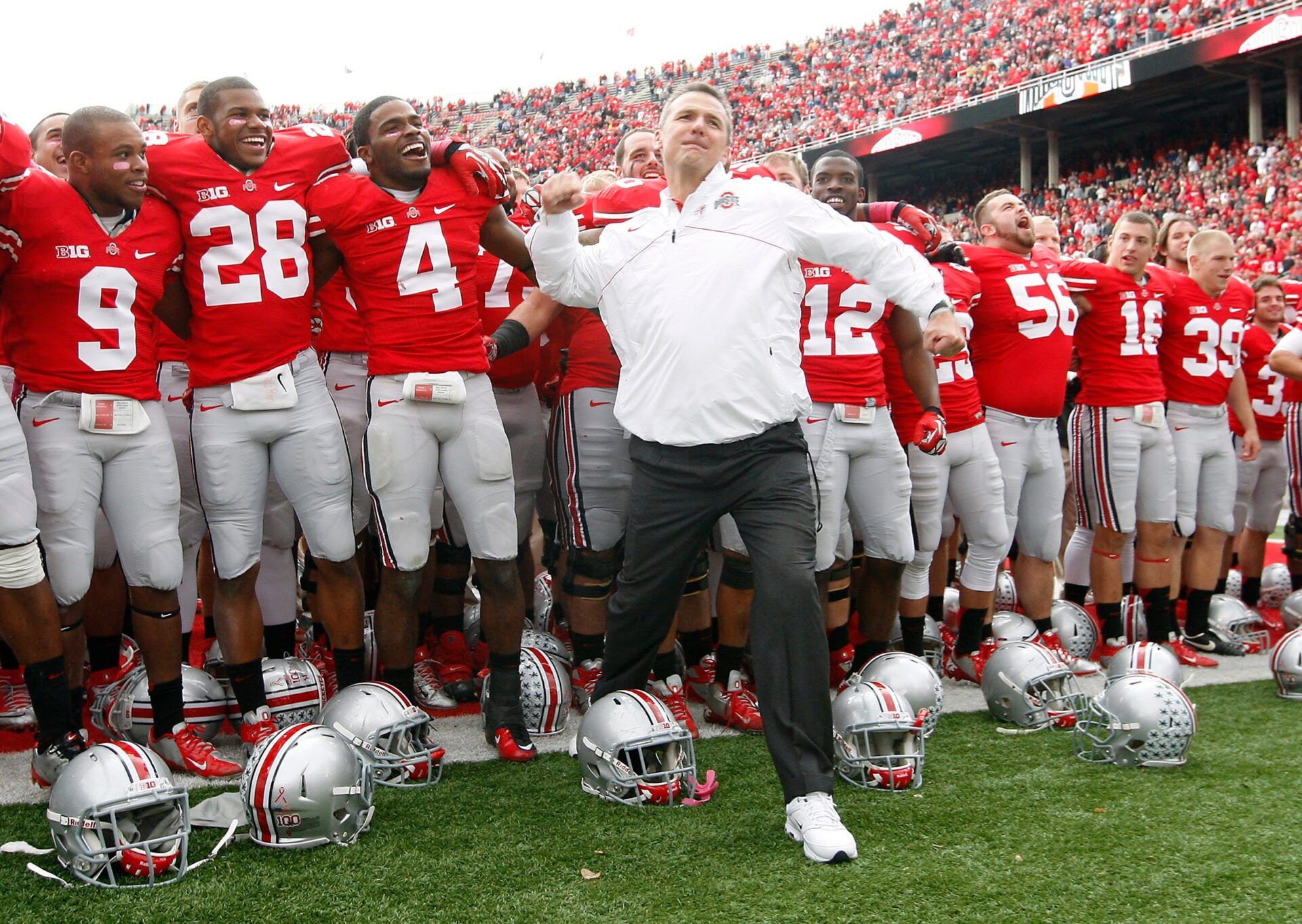 Ohio State Buckeyes head coach Urban Meyer gives a fist pump to the student section following the Buckeyes' 29-22 win over Purdue in the NCAA football game at Ohio Stadium in Columbus on Saturday, Oct. 20, 2012. (Dispatch photo by Adam Cairns)