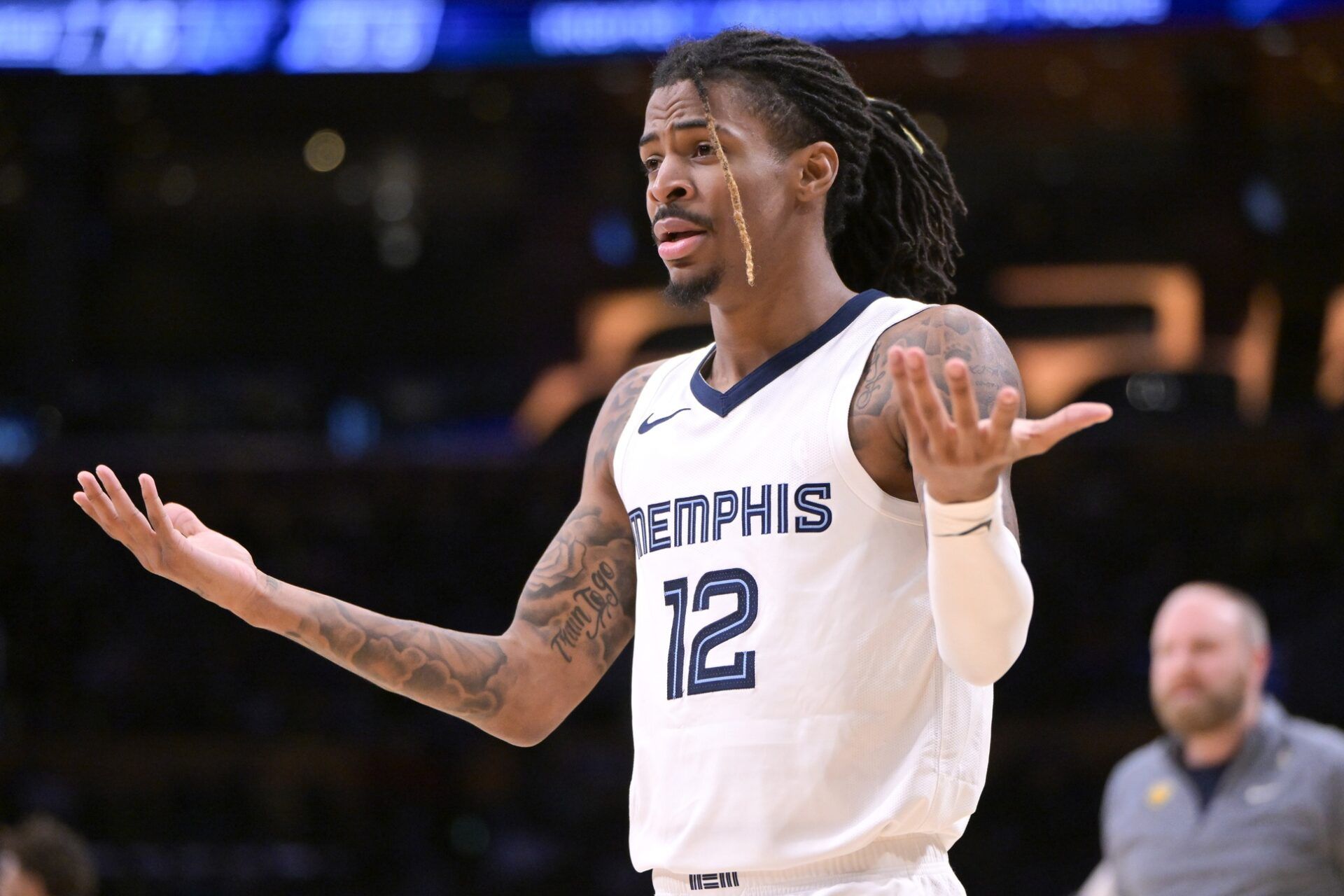 Memphis Grizzlies guard Ja Morant (12) reacts in the second half against the Los Angeles Lakers at Crypto.com Arena.