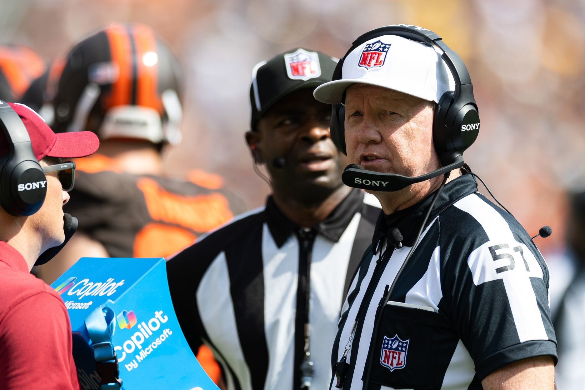 NFL referee Carl Cheffers (51) reviews a play during the first half between the Cleveland Browns and the Green Bay Packers at Huntington Bank Field.
