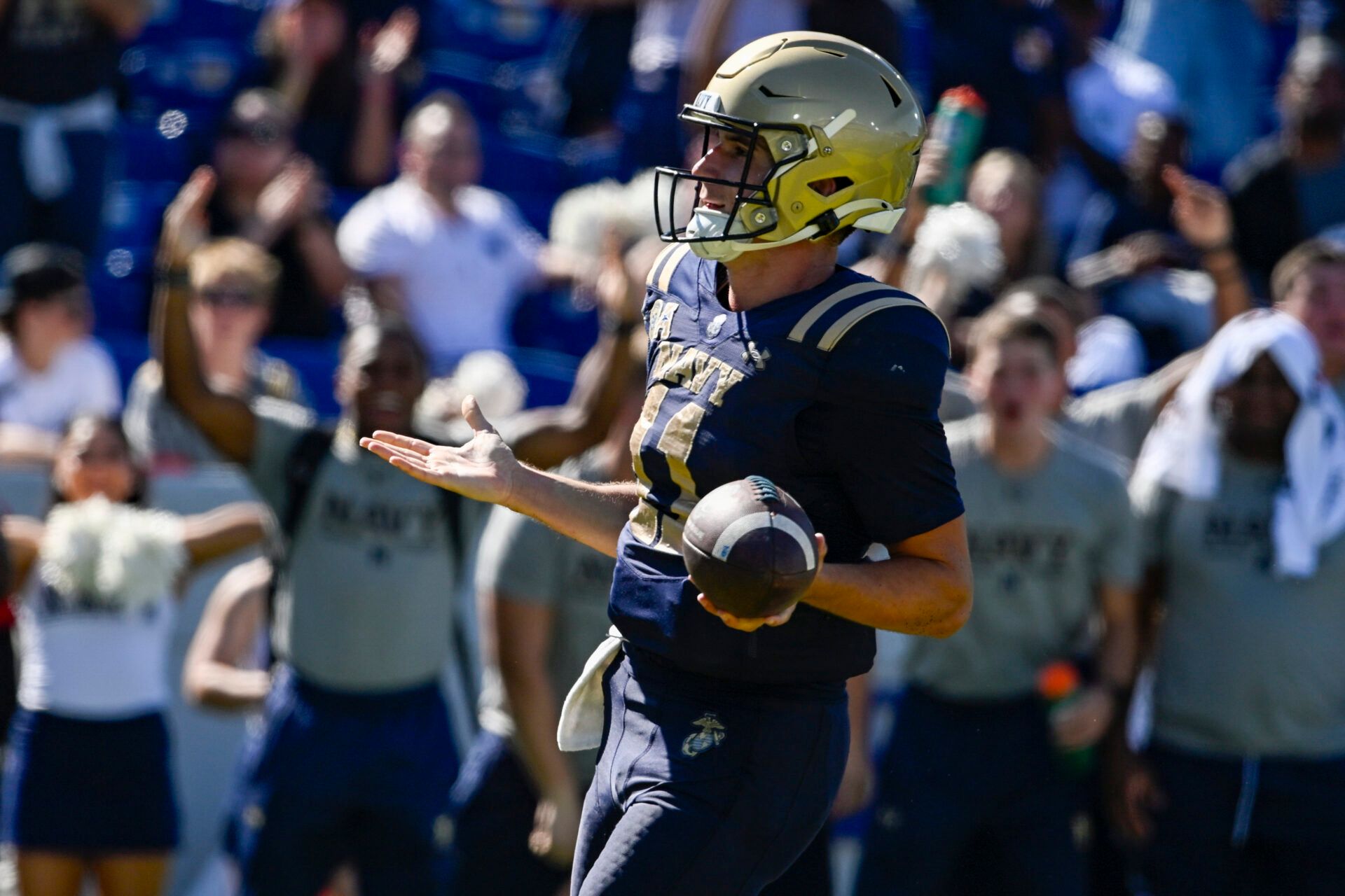 Navy Midshipmen quarterback Blake Horvath (11) reacts after scoring a touchdown during the second half against the Air Force Falcons  at Navy-Marine Corps Memorial Stadium.