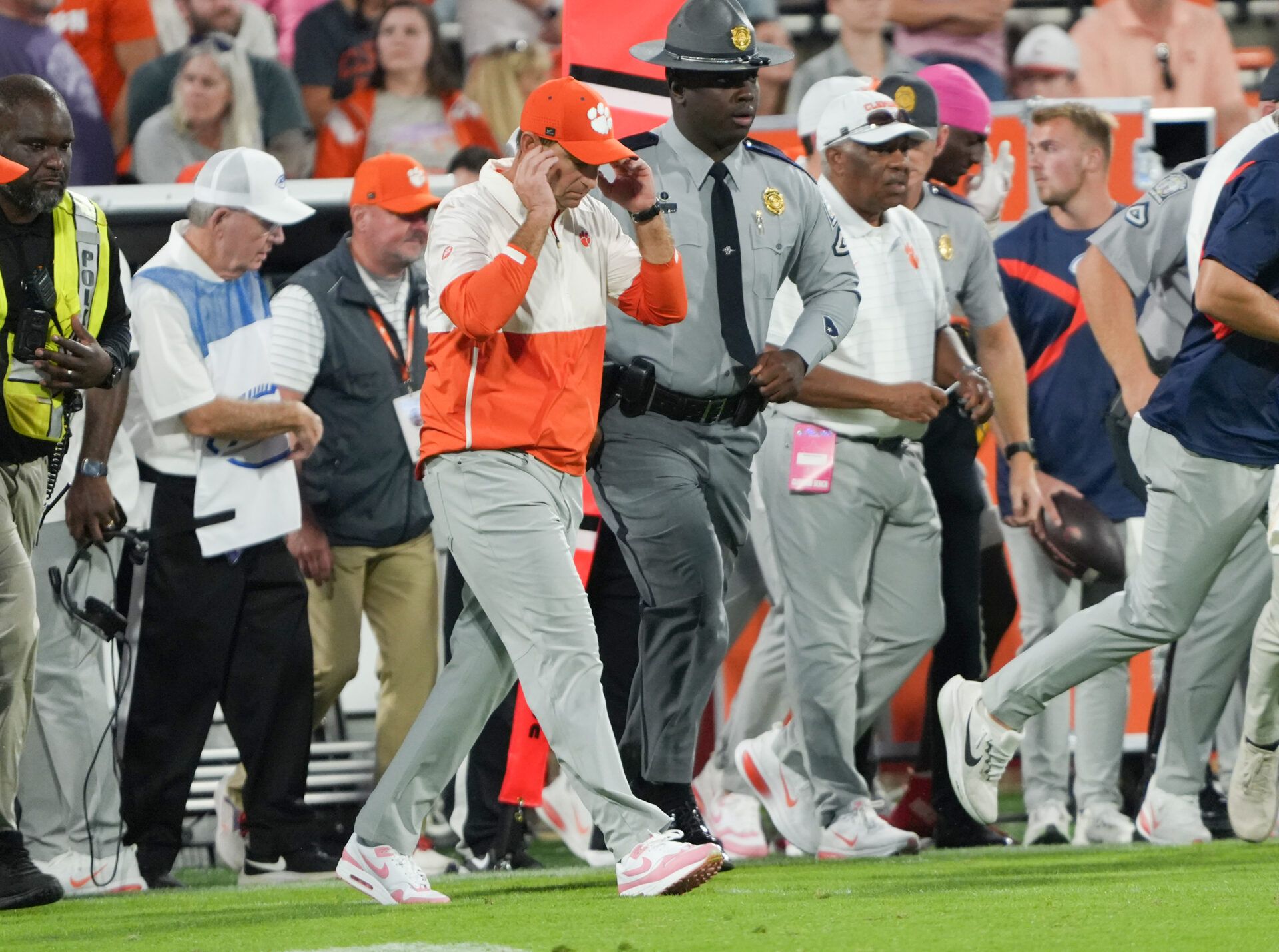 Clemson Tigers head coach Dabo Swinney walks over to meet Southern Methodist Mustangs head coach Rhett Lashlee (not shown) after the game at Memorial Stadium.