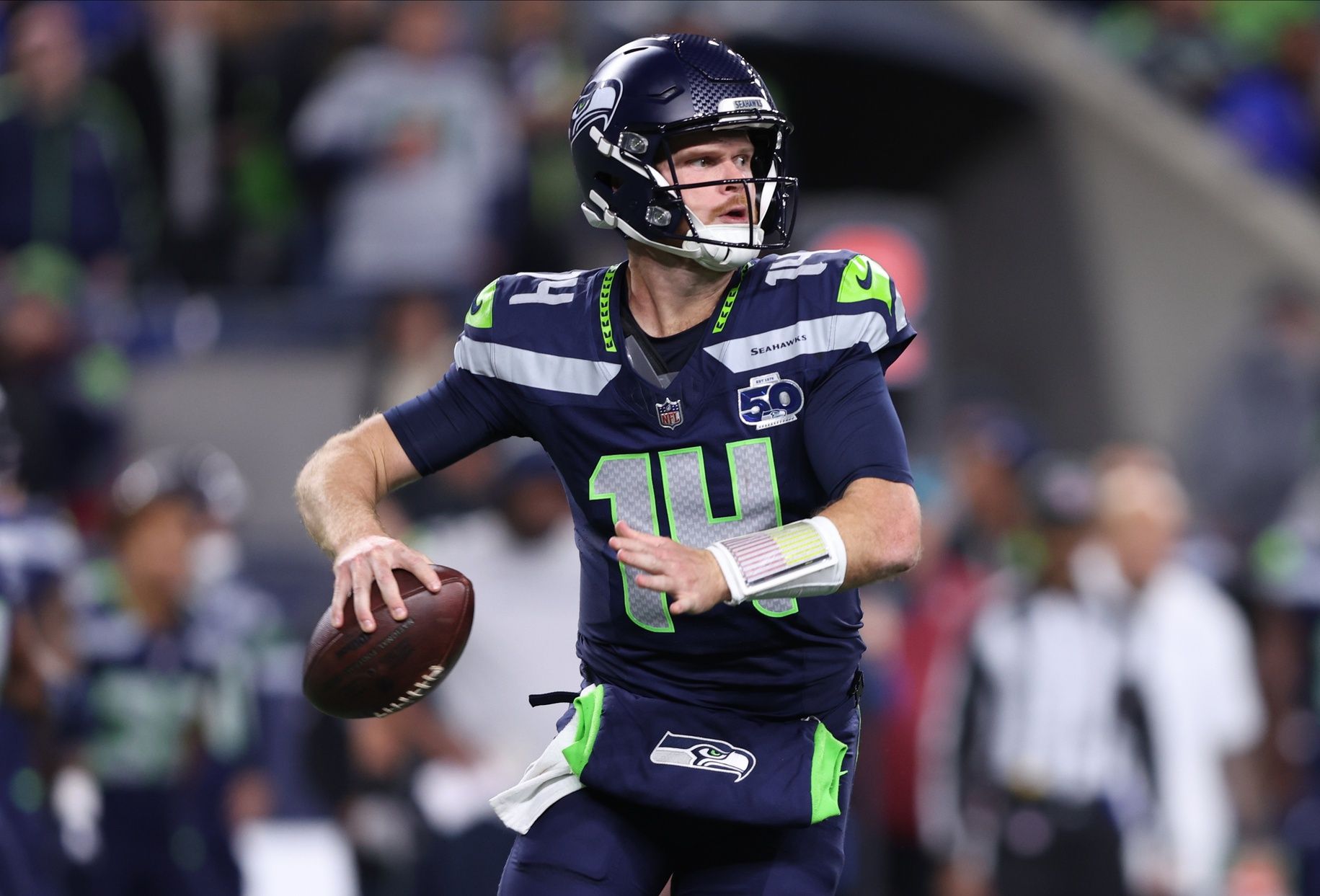 Seattle Seahawks quarterback Sam Darnold (14) looks to throw a pass during the second quarter against the Houston Texans at Lumen Field.