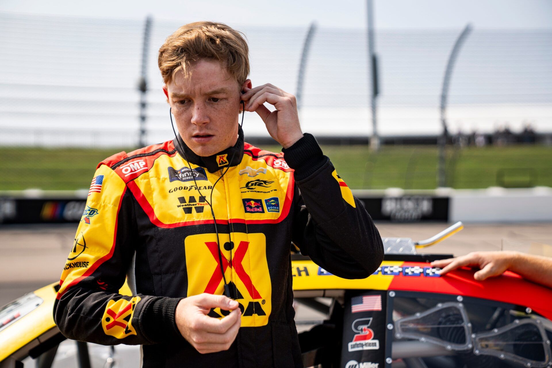 Connor Zilisch (88) puts in earpieces during NASCAR Xfinity Series qualifying on Aug. 2, 2025, at Iowa Speedway in Newton, Iowa.