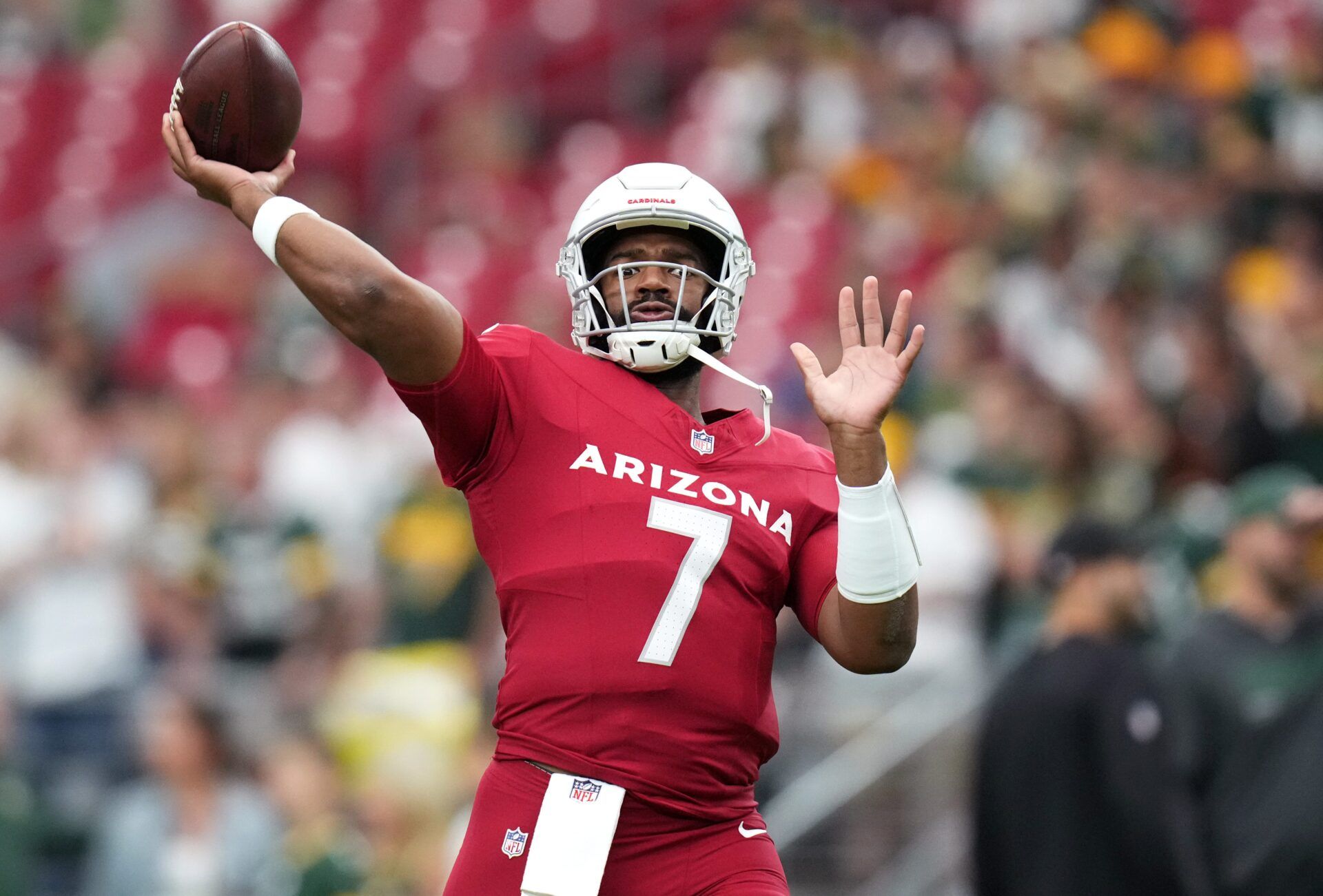 Arizona Cardinals quarterback Jacoby Brissett (7) warms up before they play against the Green Bay Packers at State Farm Stadium in Glendale on Oct. 19, 2025.