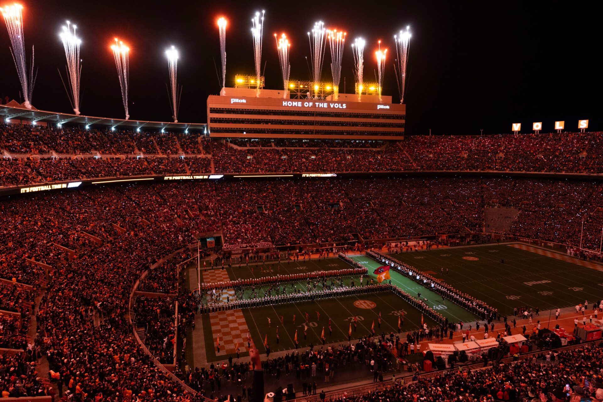 Tennessee players “Run Through the T” as they take the field for the NCAA college football game against Oklahoma on November 1, 2025, in Knoxville, Tenn.
