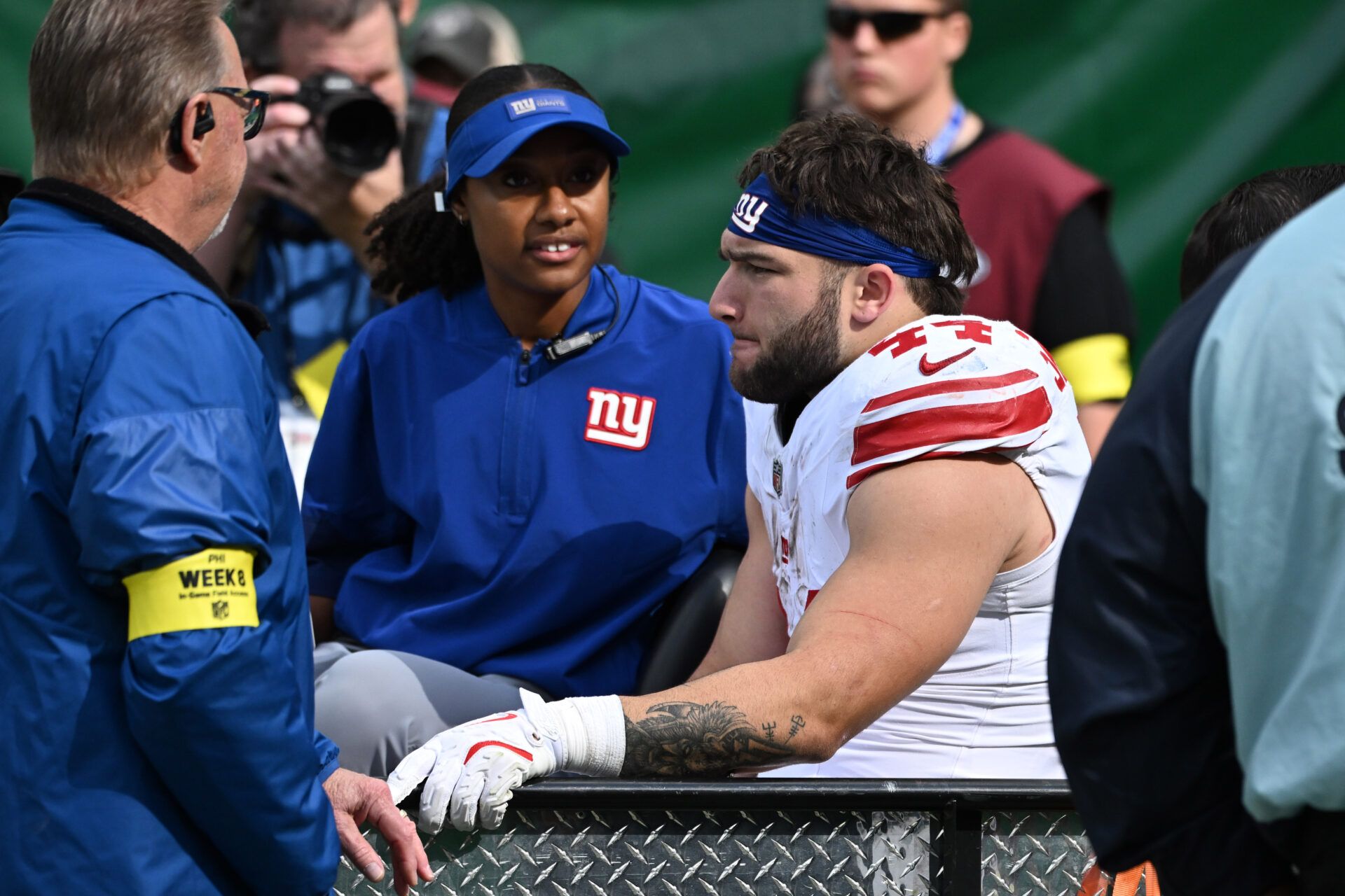 New York Giants running back Cam Skattebo (44) is carted off the field with a leg injury during the second quarter against the Philadelphia Eagles at Lincoln Financial Field.