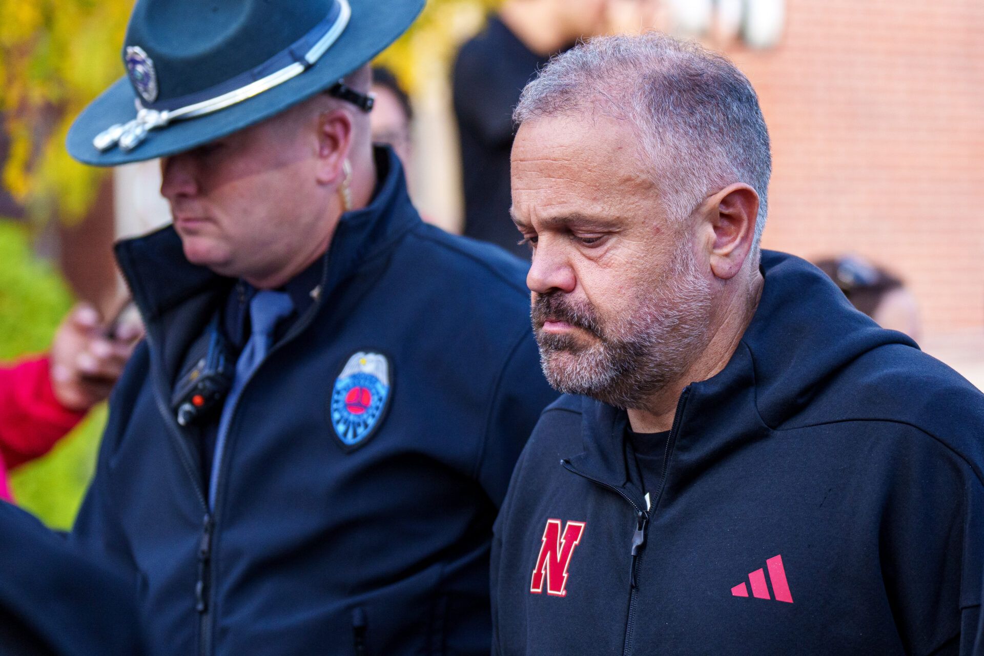 Nebraska Cornhuskers head coach Matt Rhule arrives at the stadium with the team before the game against the Southern California Trojans at Memorial Stadium.
