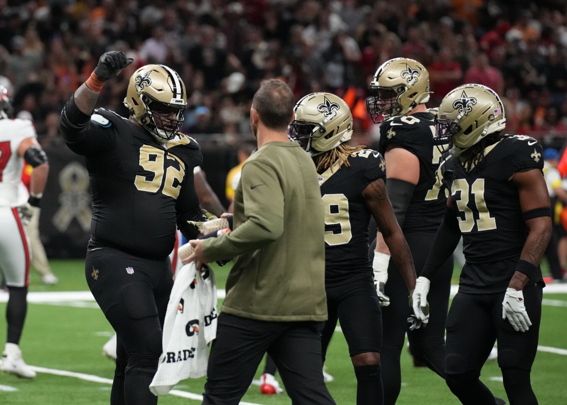 New Orleans Saints defensive tackle Davon Godchaux (92) reacts during the first quarter against the Tampa Bay Buccaneers at Caesars Superdome.