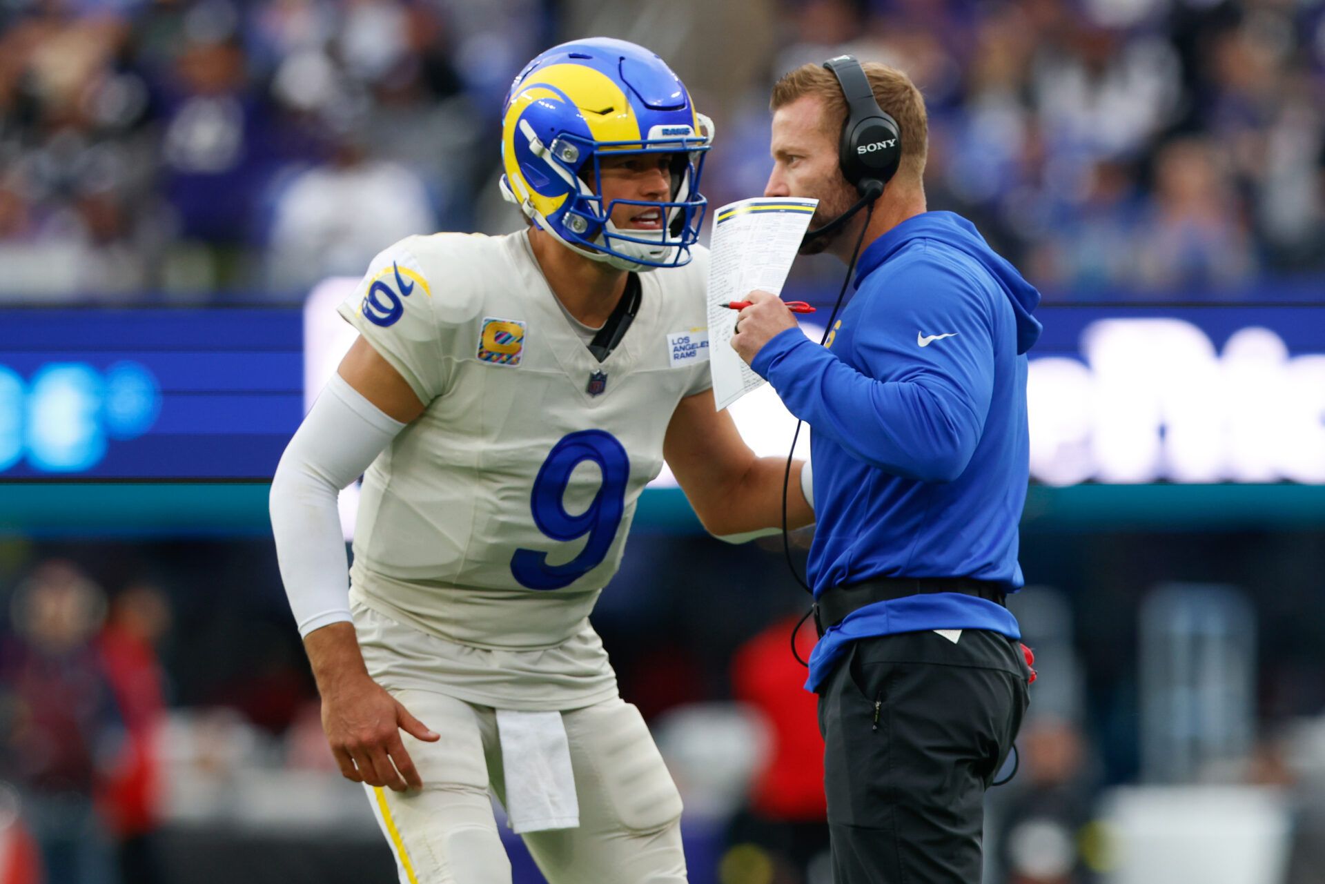 Los Angeles Rams quarterback Matthew Stafford (9) speaks with head coach Sean McVay during the second half of the game against the Baltimore Ravens at M&T Bank Stadium.