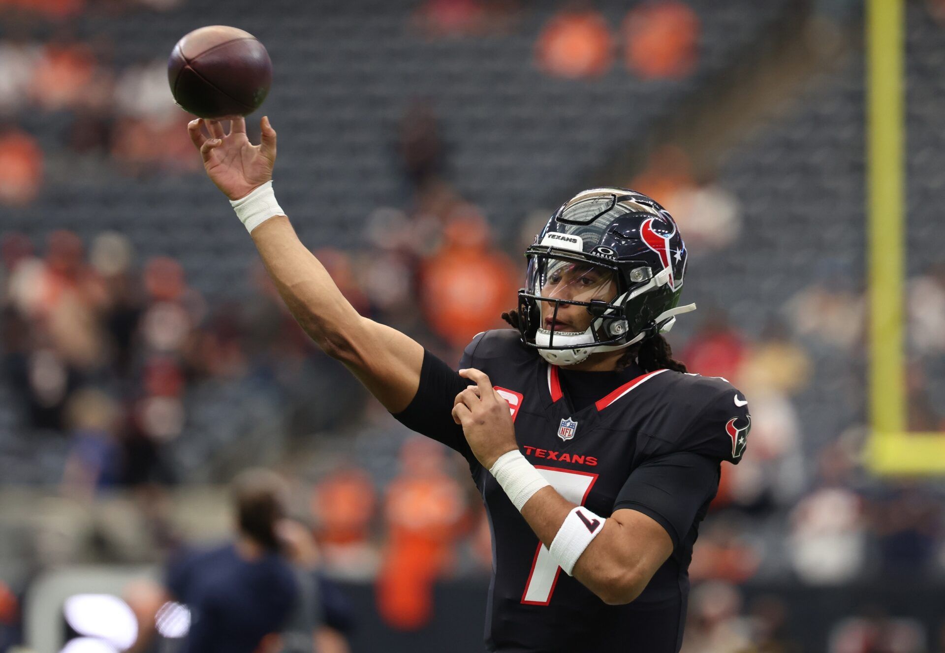 Houston Texans quarterback C.J. Stroud (7) warms up before a game against the Denver Broncos at NRG Stadium.