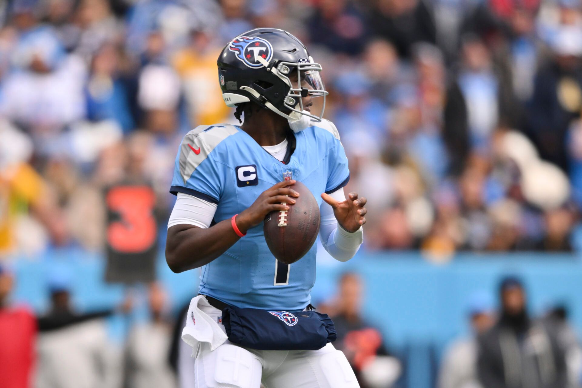 Tennessee Titans quarterback Cam Ward (1) looks to pass against the Los Angeles Chargers  during the first quarter at Nissan Stadium.
