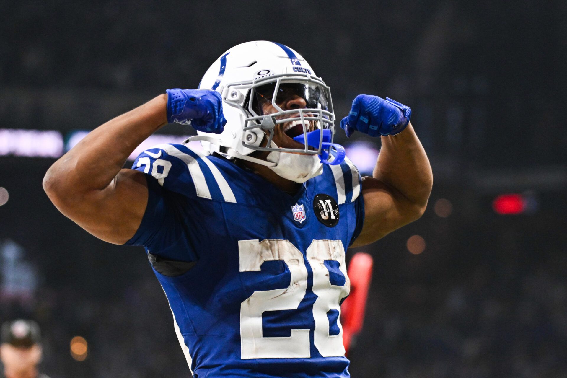 Indianapolis Colts running back Jonathan Taylor (28) celebrates after scoring a touchdown during the third quarter against the Tennessee Titans at Lucas Oil Stadium.