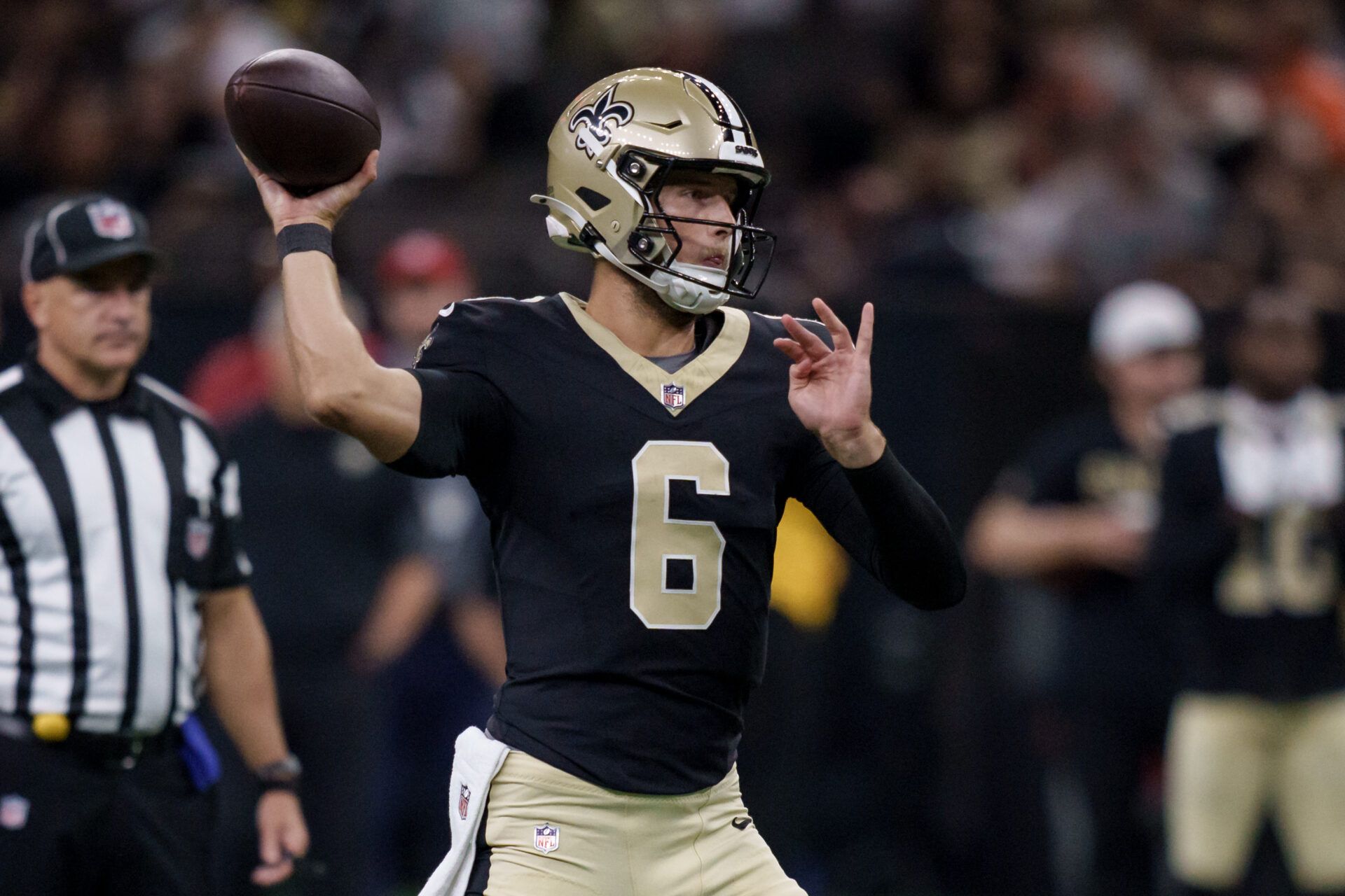 New Orleans Saints quarterback Tyler Shough (6) throws against the Denver Broncos during the first half at Caesars Superdome.