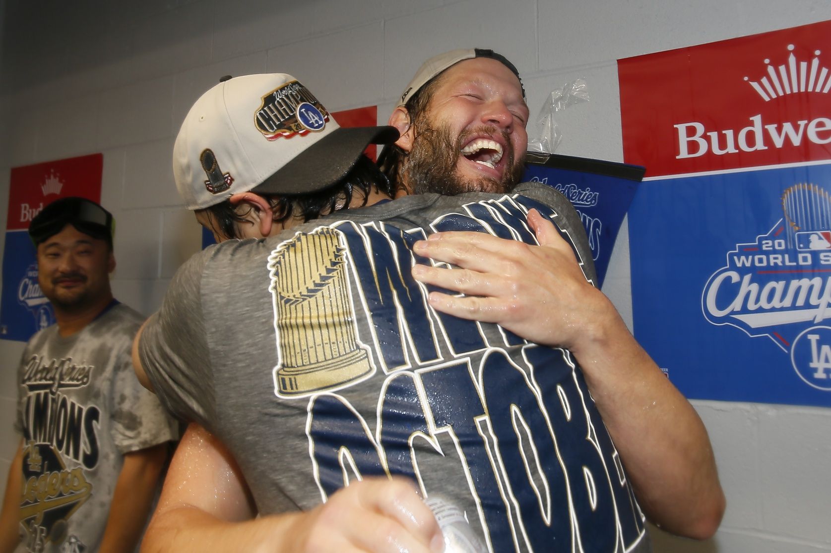 Los Angeles Dodgers pitcher Clayton Kershaw (22) and two-way player Shohei Ohtani (17) celebrate after defeating the Toronto Blue Jays in the 2025 MLB World Series at Rogers Centre.
