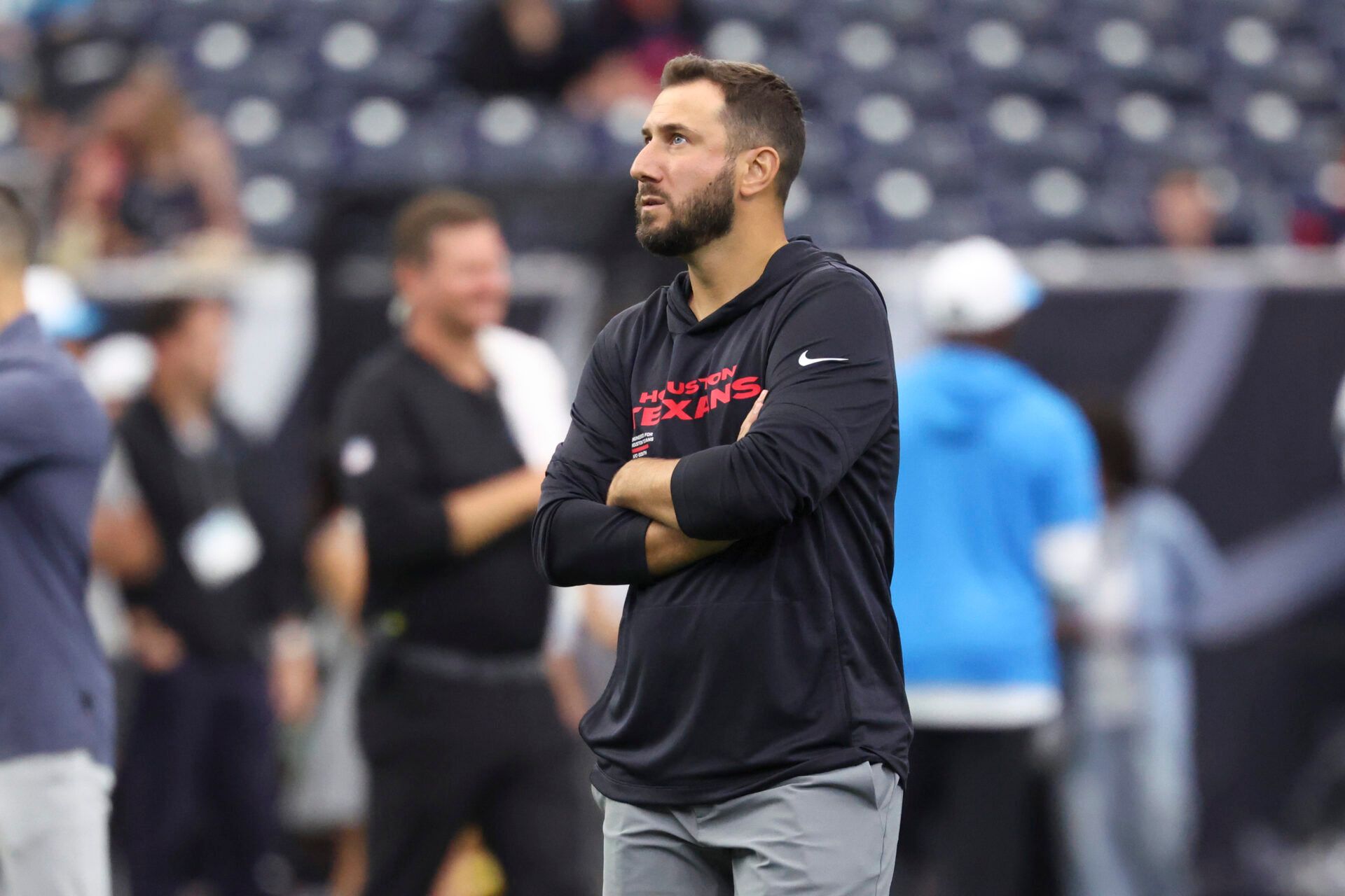Houston Texans offensive coordinator Nick Caley stands on the field before the game against the Carolina Panthers at NRG Stadium.