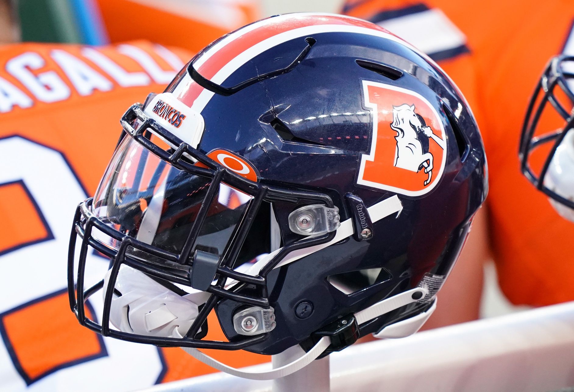 A general view of the Denver Broncos helmet on sidelines against the Buffalo Bills during the second quarter at Empower Field at Mile High.