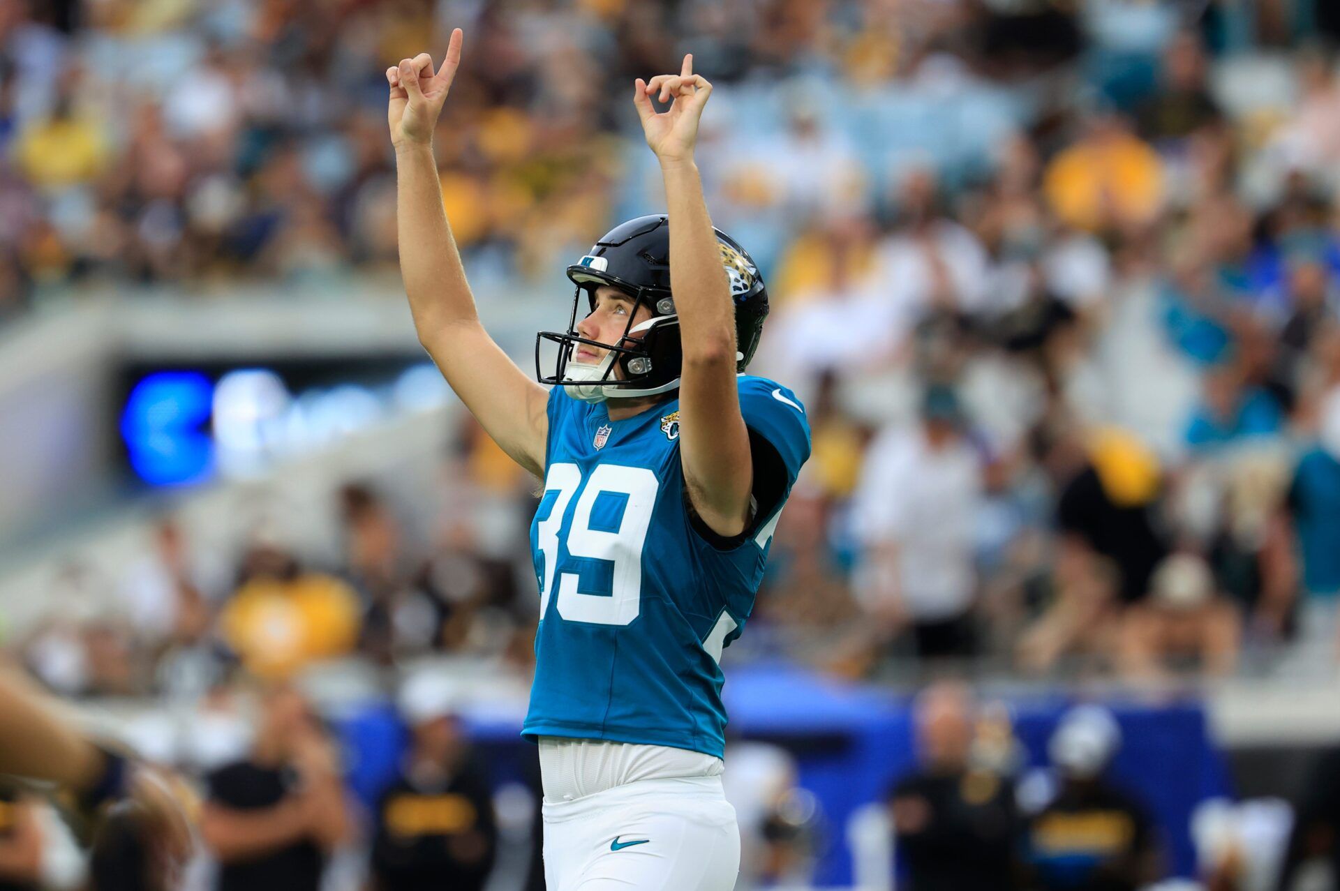 Jacksonville Jaguars place kicker Cam Little (39) points skyward after a field goal socre during the first quarter of an NFL preseason matchup at EverBank Stadium, Saturday, Aug. 9, 2025 in Jacksonville, Fla. [Corey Perrine/Florida Times-Union]