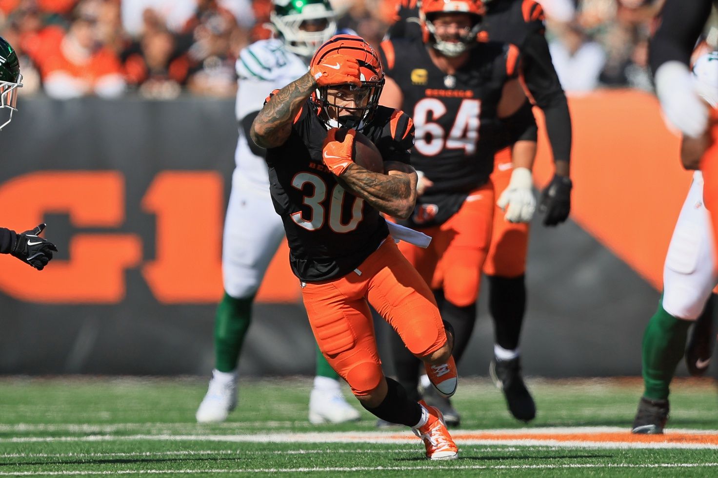 Cincinnati Bengals running back Chase Brown (30) runs with the ball during the second quarter against the New York Jets at Paycor Stadium.