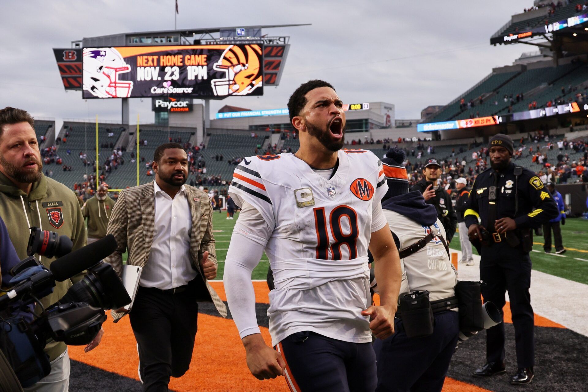 Chicago Bears quarterback Caleb Williams (18) reacts as he walks off the field after defeating the Cincinnati Bengals in the fourth quarter at Paycor Stadium.