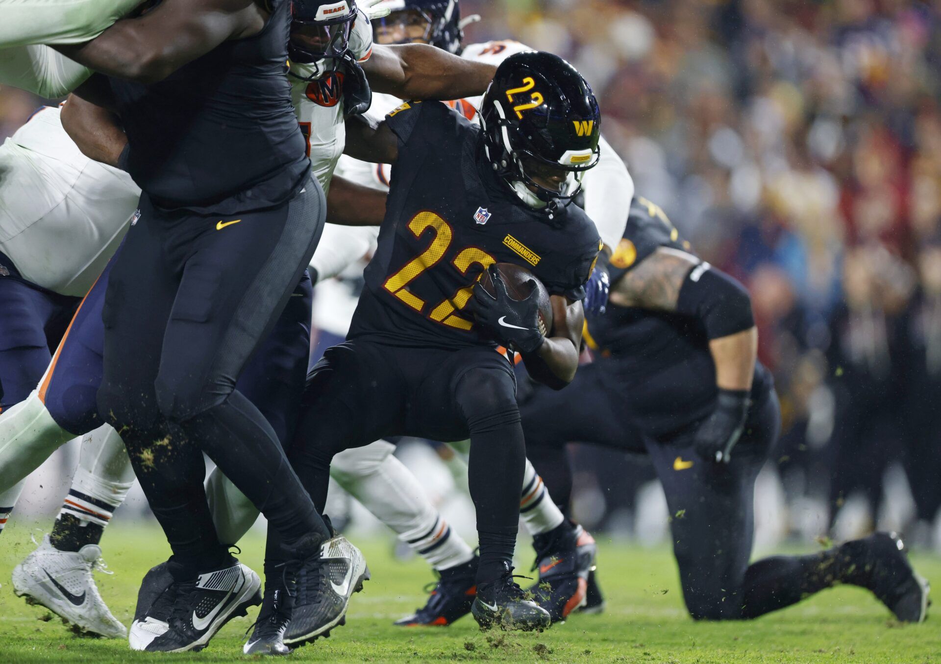 Washington Commanders running back Jacory Croskey-Merritt (22) runs with the ball against the Chicago Bears during the first quarter at Northwest Stadium.