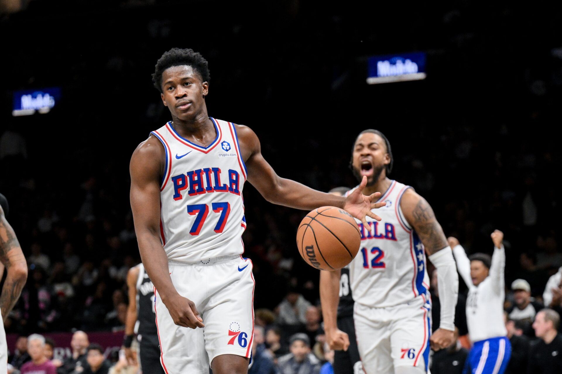 Philadelphia 76ers guard VJ Edgecombe (77) reacts after a dunk against the Brooklyn Nets during the first half at Barclays Center.