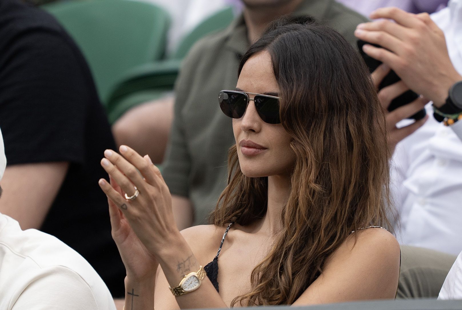 Eiza Gonzalez watches the match of boyfriend, Grigor Diitrov of Bulgaria against Sebastian Ofner of Austria on day six at the All England Lawn Tennis and Croquet Club.