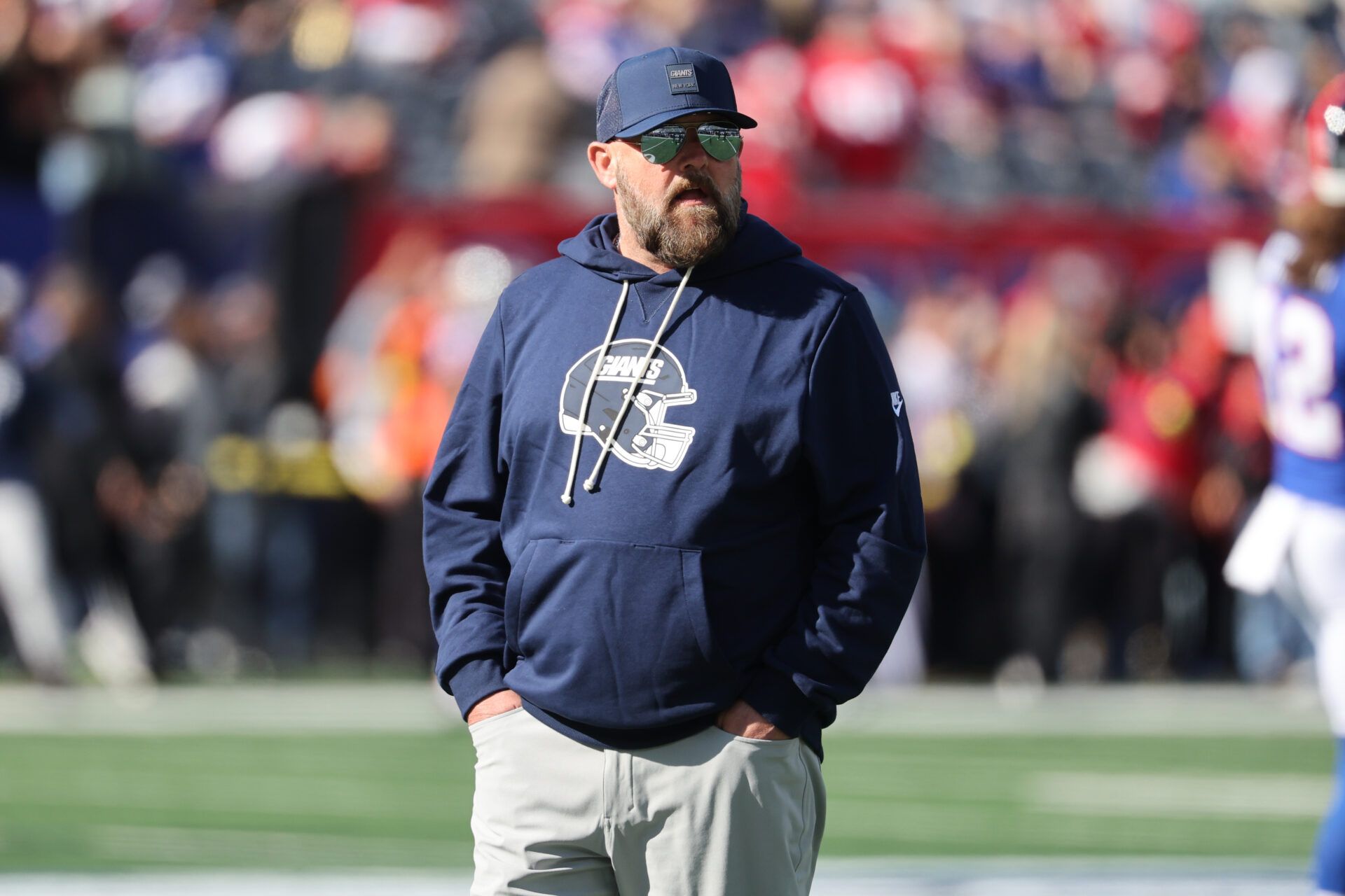 New York Giants head coach Brian Daboll stands on the field prior to a game against the San Francisco 49ers at MetLife Stadium.