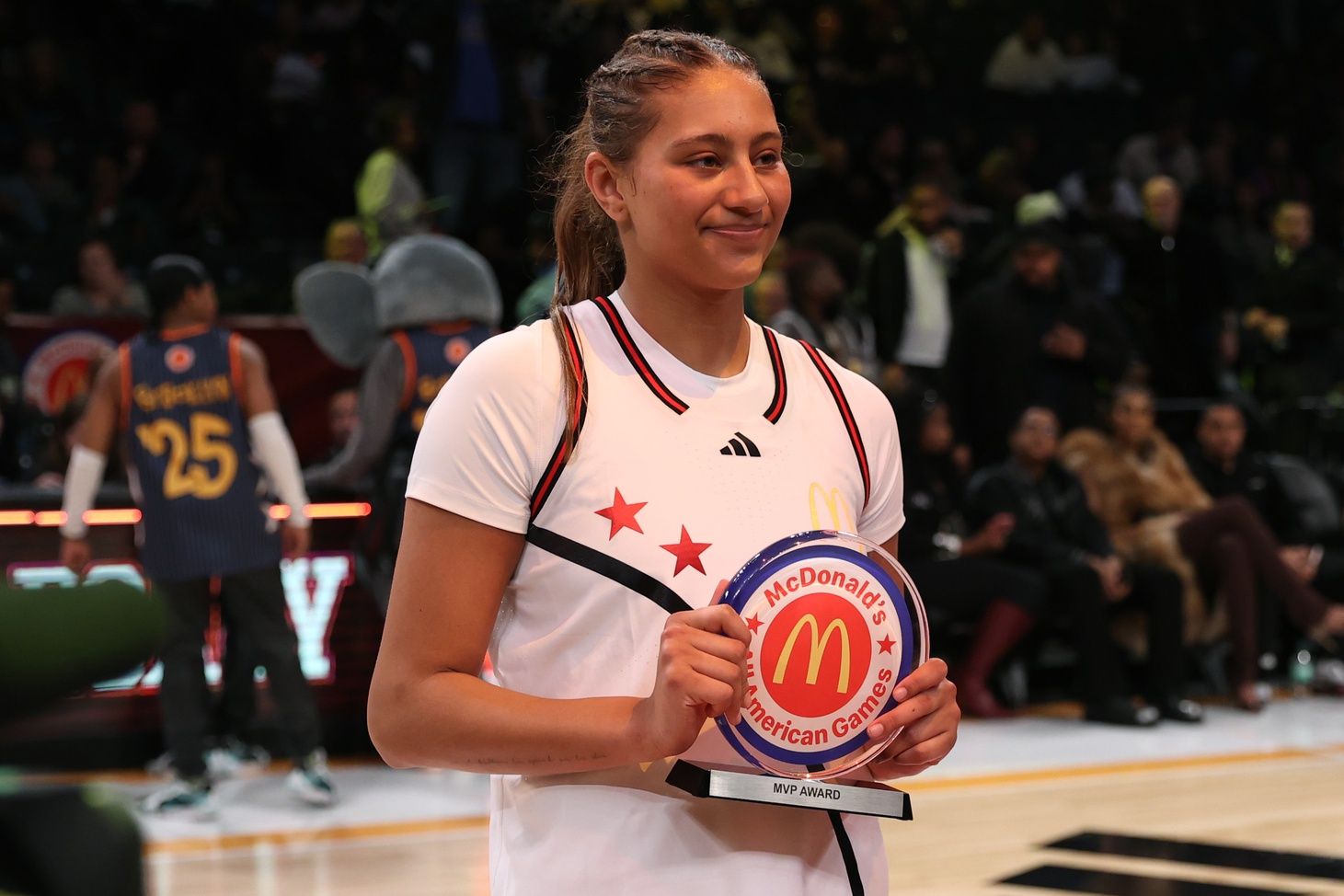 McDonald's All American West forward Sienna Betts (51) poses for photos after being named MVP at Barclays Center.