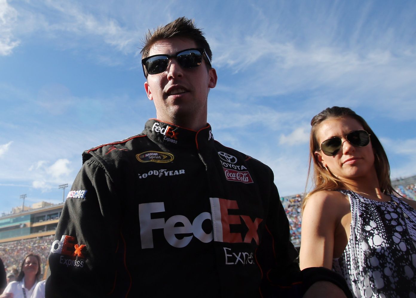 NASCAR Sprint Cup Series driver Denny Hamlin with girlfriend Jordan Fish before the Ford EcoBoost 400 at Homestead-Miami Speedway.
