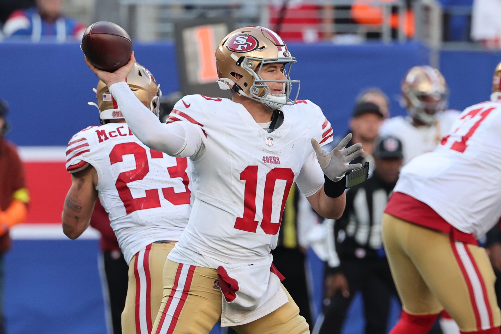 San Francisco 49ers quarterback Mac Jones (10) passes the ball against the New York Giants during the second half at MetLife Stadium.