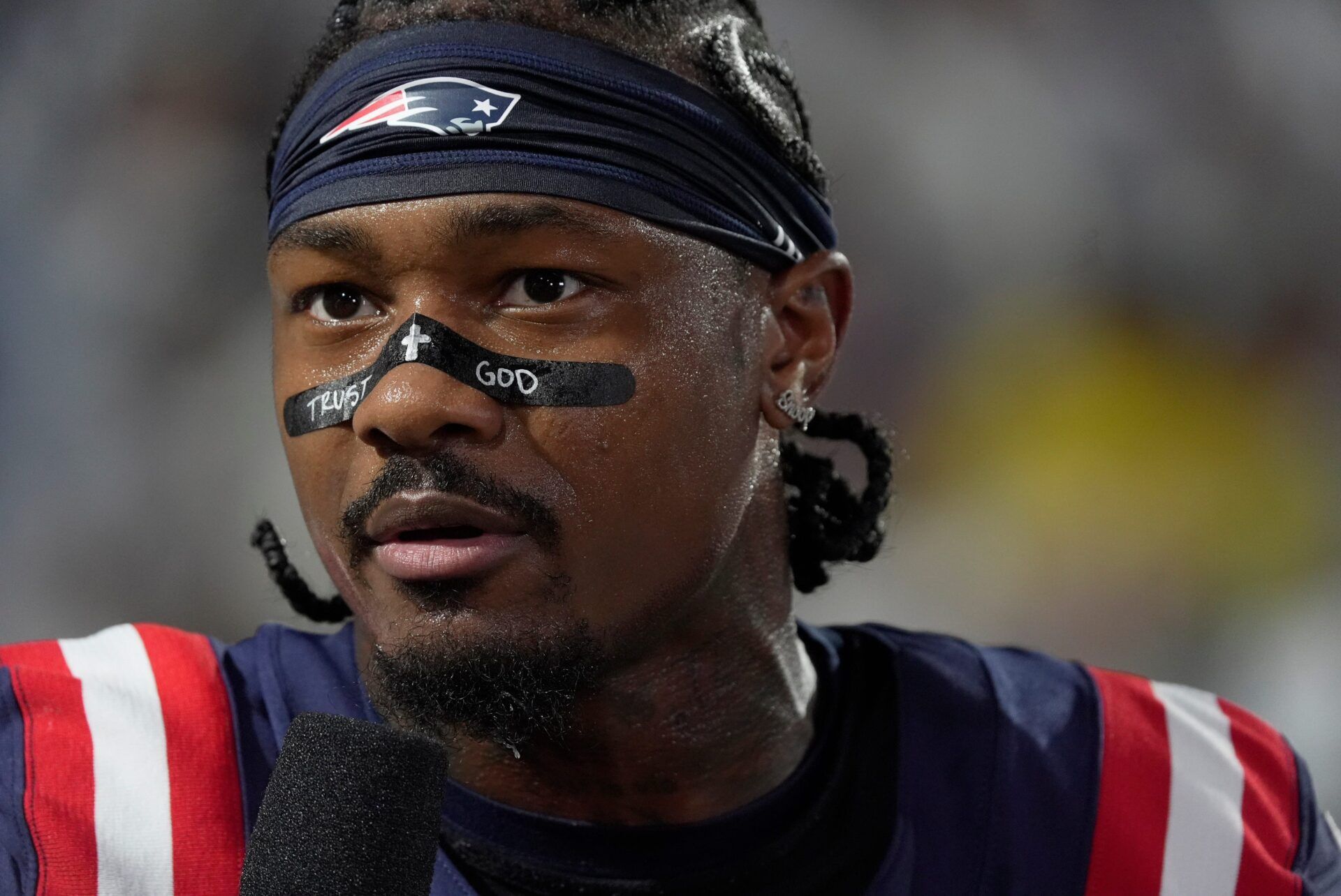 New England Patriots wide receiver Stefon Diggs talks with a sidelines reporter before the Bills home game against the New England Patriots at Highmark Stadium in Orchard Park on Oct. 5, 2025.
