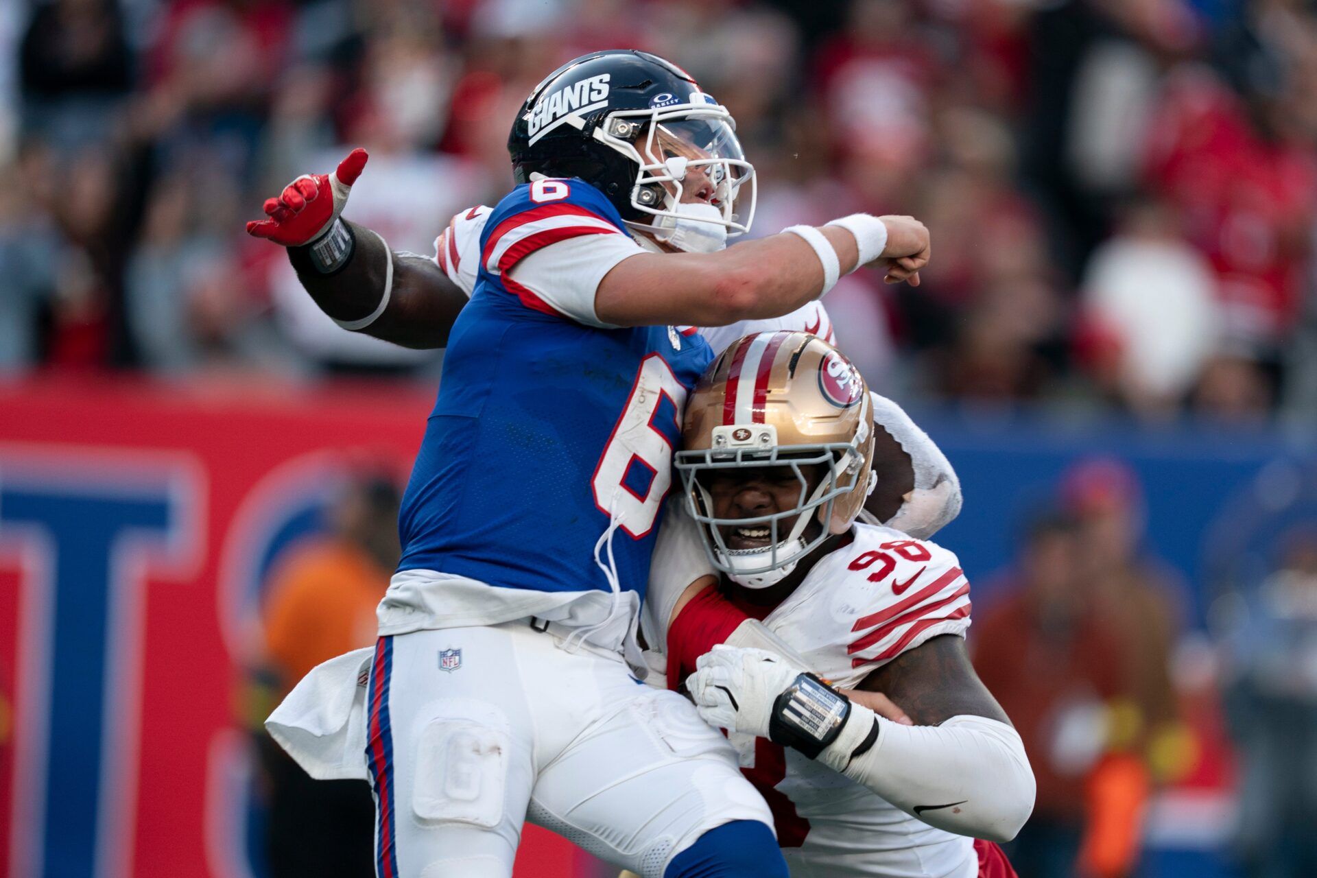 New York Giants quarterback Jaxson Dart (6) throws the ball away to avoid a sack during a week 9 game between New York Giants and San Francisco 49ers at MetLife Stadium on Sunday, Nov. 2, 2025.