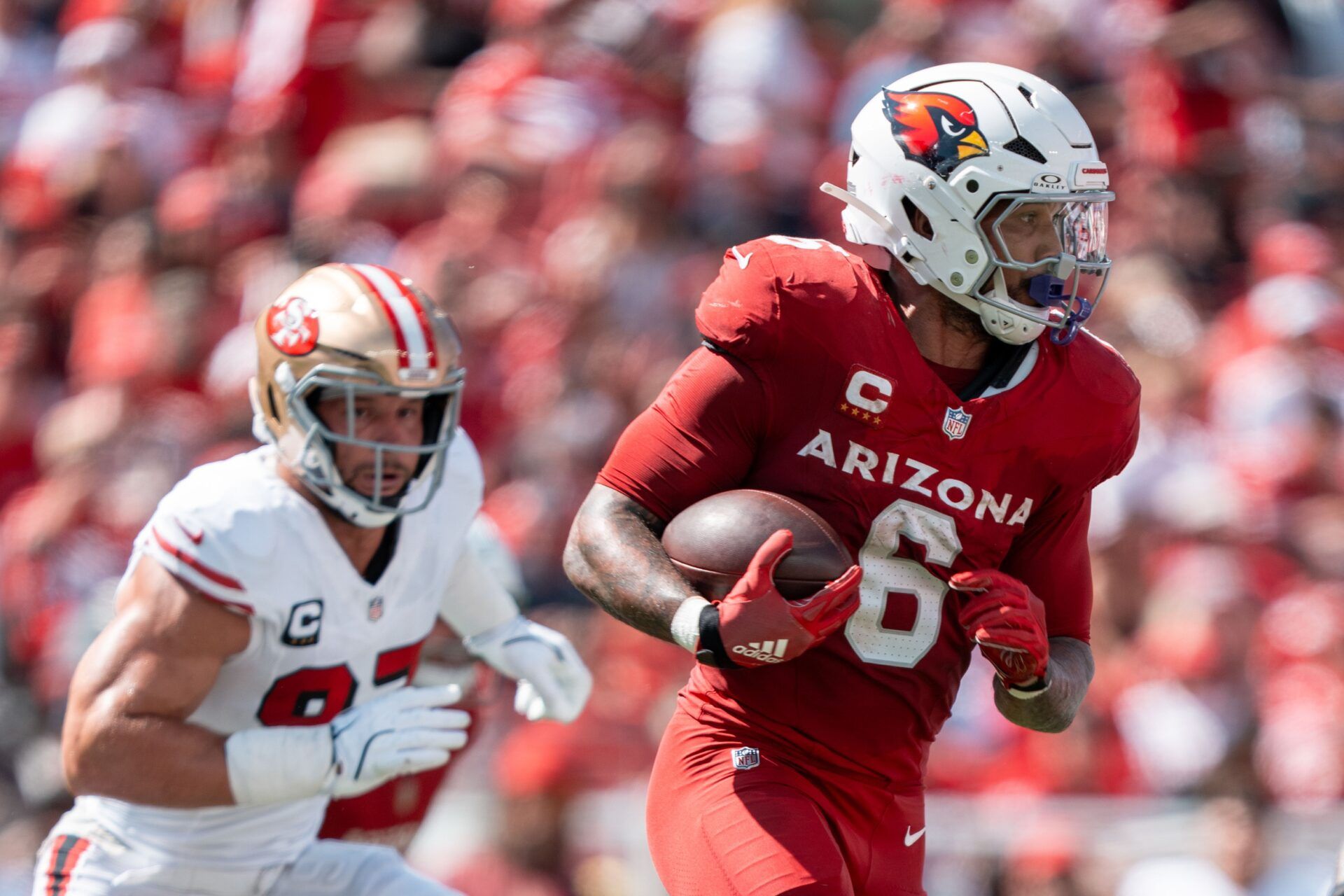 Arizona Cardinals running back James Conner (6) carries the ball against the San Francisco 49ers during the first half at Levi's Stadium.