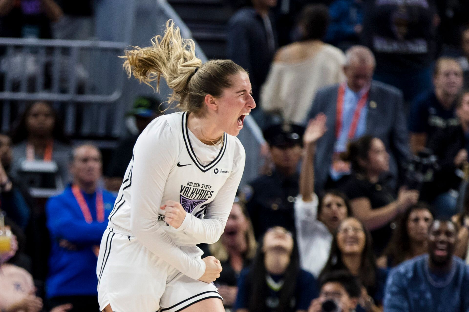 Golden State Valkyries guard Kate Martin (20) reacts after hitting a three-point shot against the Dallas Wings during the second half at Chase Center.