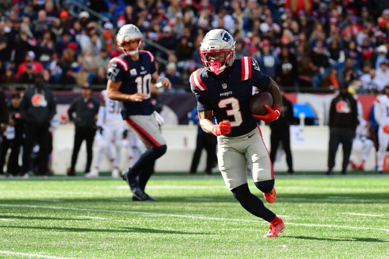 New England Patriots wide receiver Demario Douglas (3) runs with the ball during the third quarter against the Cleveland Browns at Gillette Stadium.