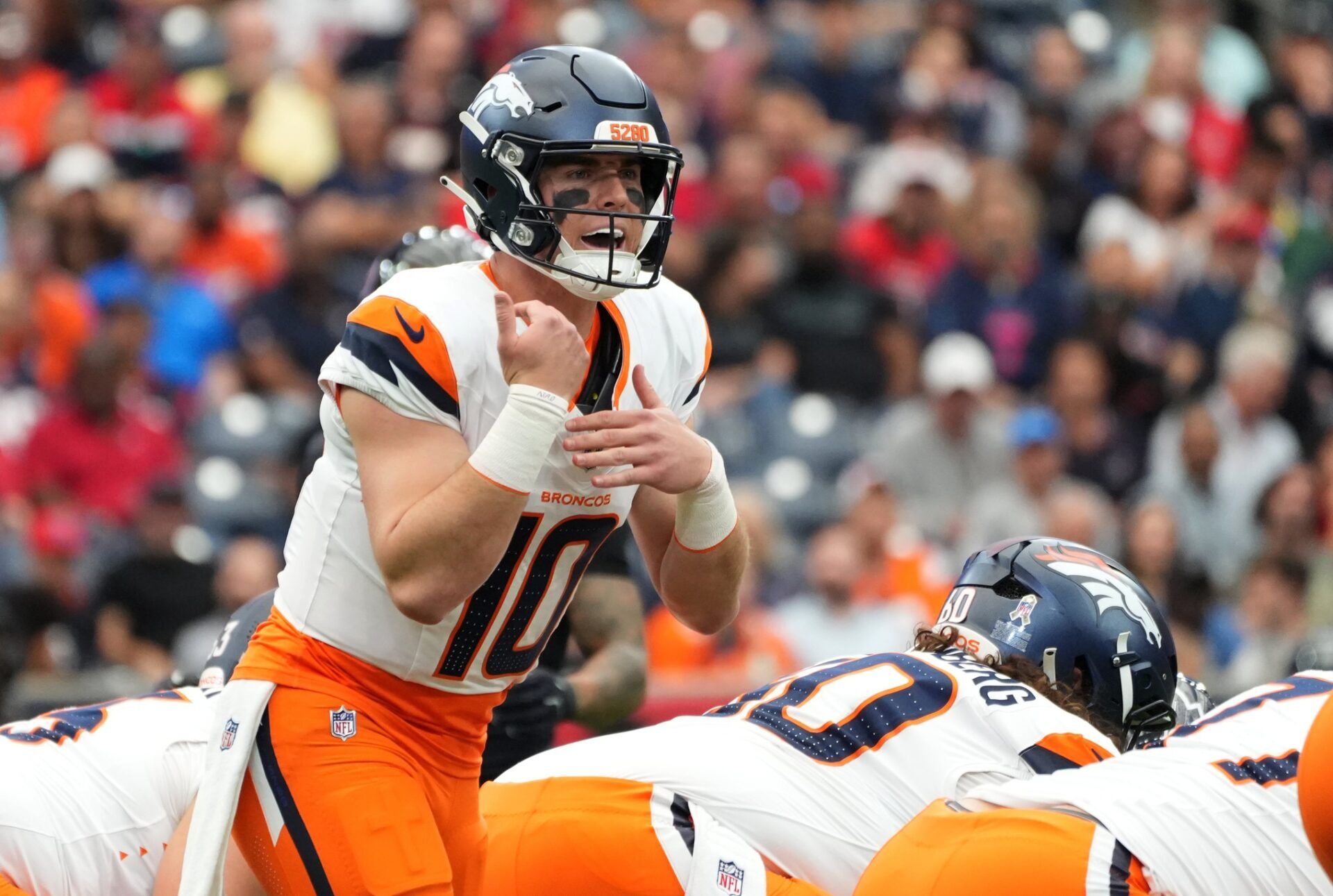 Denver Broncos quarterback Bo Nix (10) audibles during the first half against the Houston Texans at NRG Stadium.