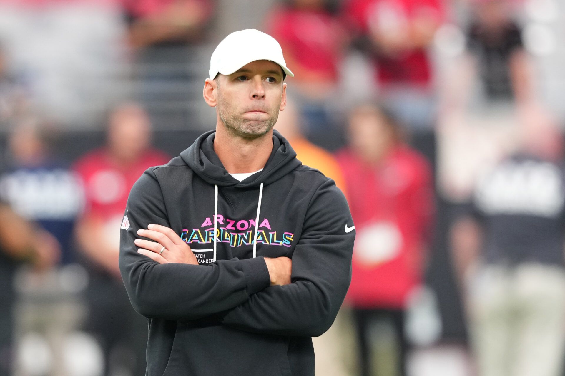 Arizona Cardinals head coach Jonathan Gannon stands on the field before their game against the Tennessee Titans at State Farm Stadium.