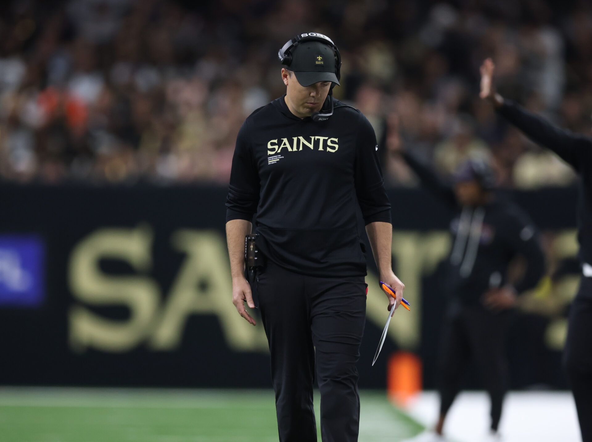 New Orleans Saints head coach Kellen Moore on the sidelines during the second half against the New England Patriots at Caesars Superdome.