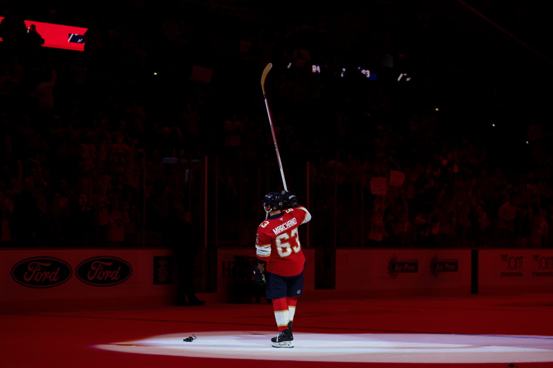 Florida Panthers left wing Brad Marchand (63) salutes the crowd after a shootout win against the Dallas Stars at Amerant Bank Arena.